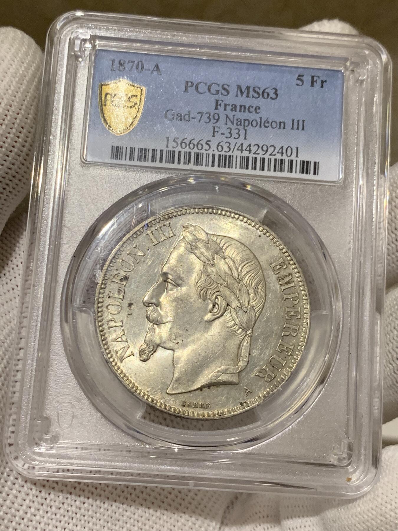 《竞宝斋》第279场- 周日，周一 ，周二3场连拍 （全场包邮） PCGS MS63 法国1870拿破仑三世5法郎银币，末年银币法系算比较好看的设计，法系持续上涨品，高分难得。