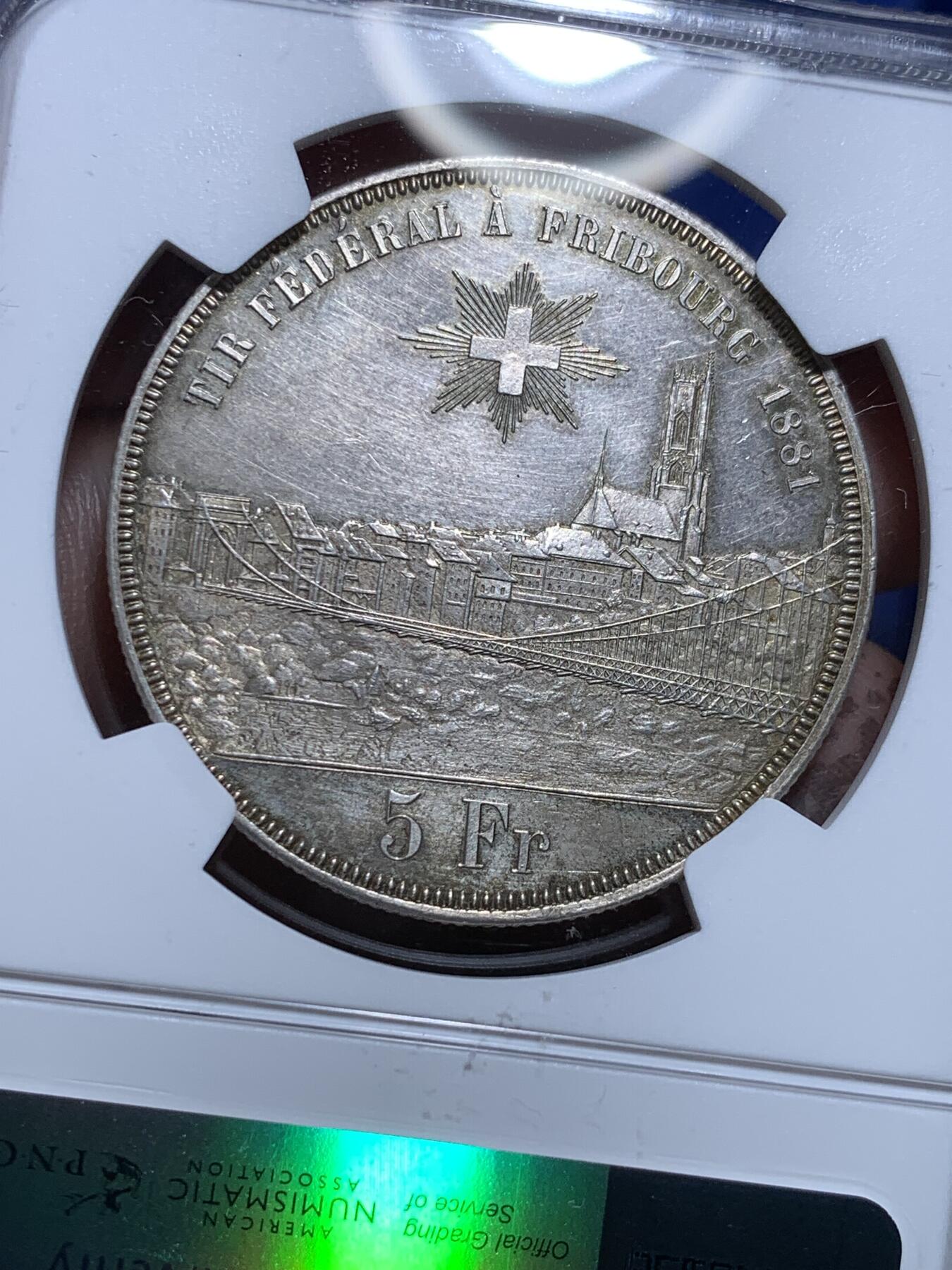 《竞宝斋》第279场- 周日，周一 ，周二3场连拍 （全场包邮） NGC UNC 1881年瑞士弗莱堡射击节5法郎大银币 全镜面底板，观感极佳，低评
