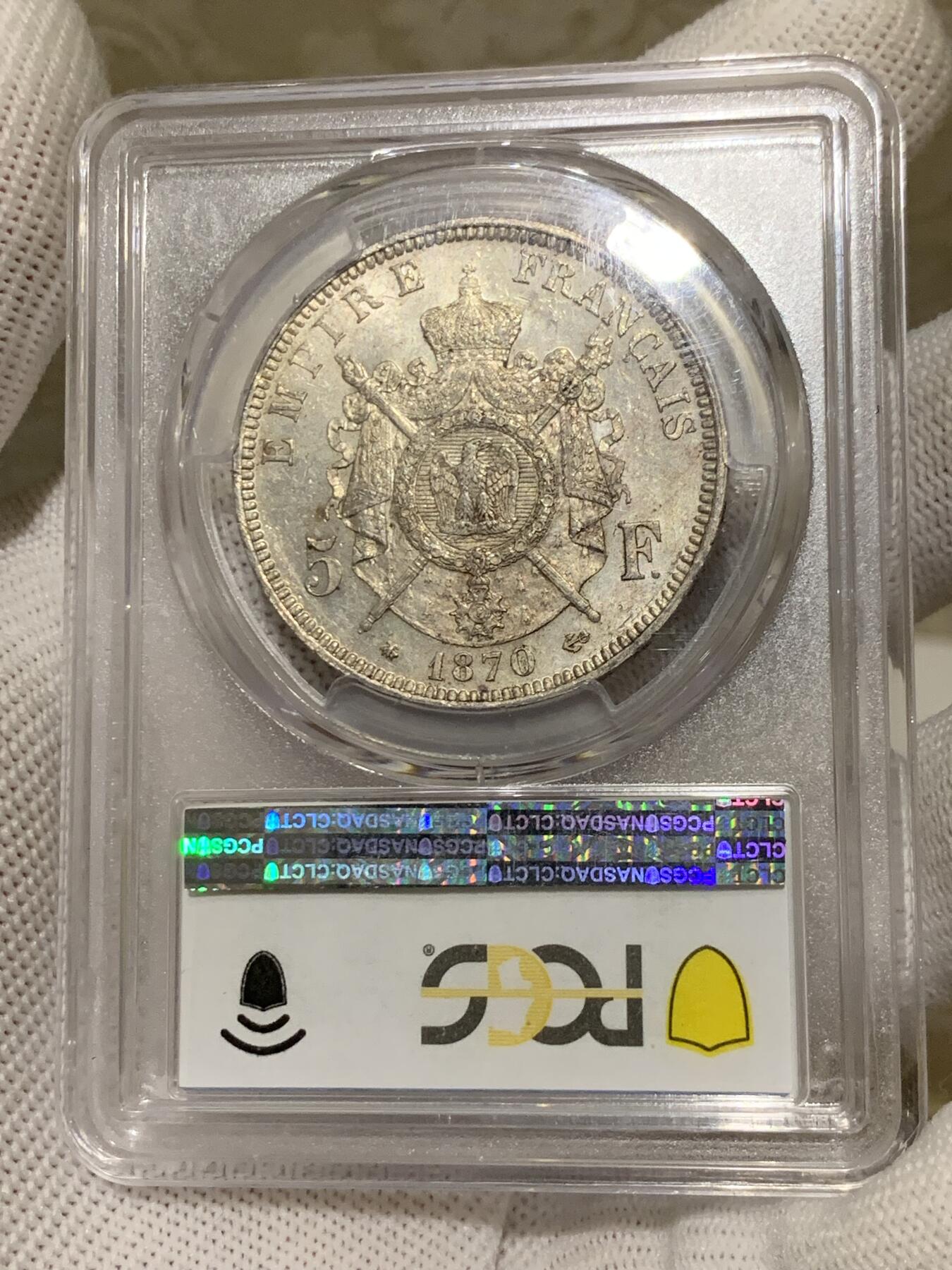 《竞宝斋》第279场- 周日，周一 ，周二3场连拍 （全场包邮） PCGS MS63 法国1870拿破仑三世5法郎银币，末年银币法系算比较好看的设计，法系持续上涨品，高分难得。