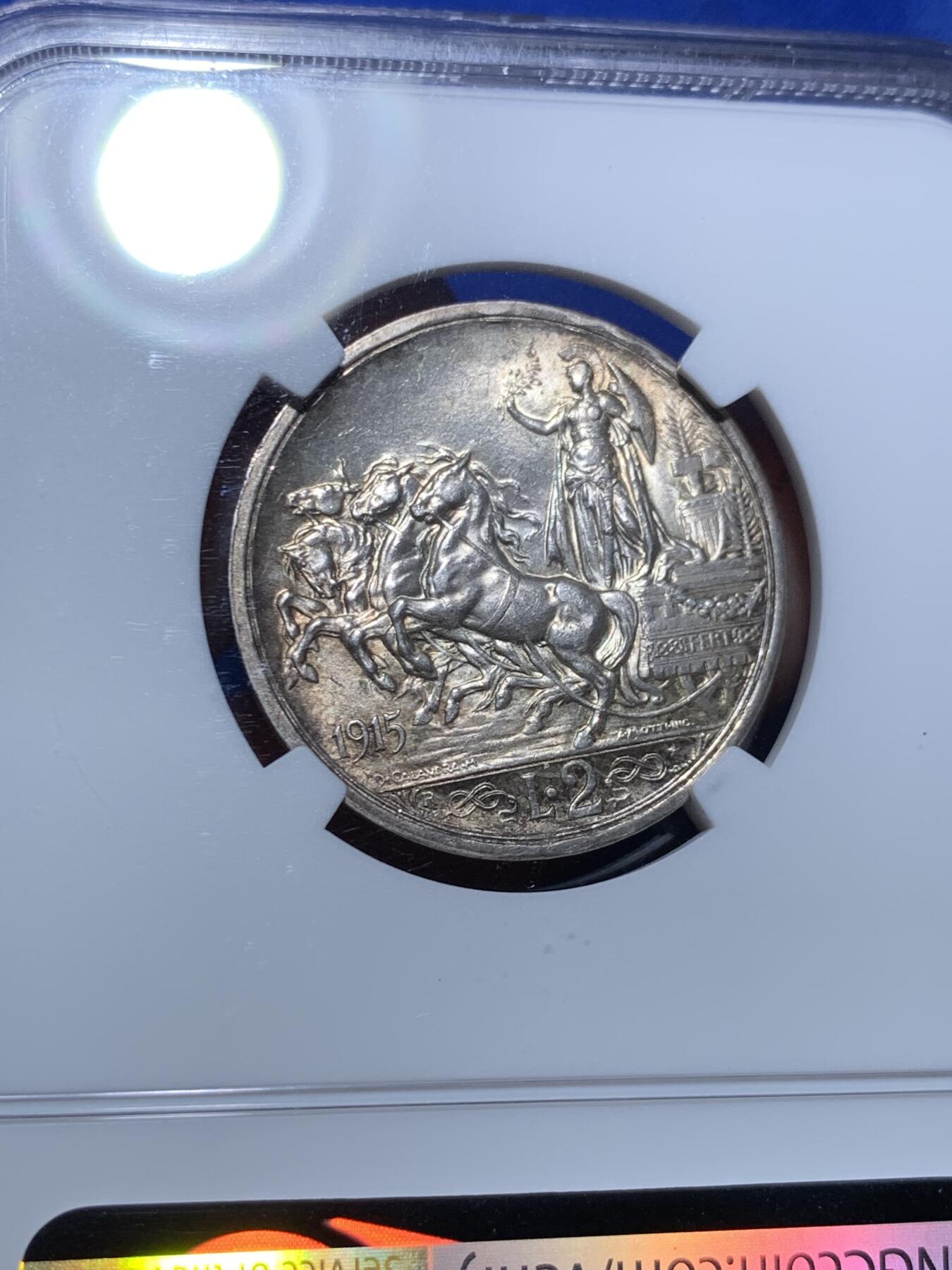 《竞宝斋》第279场- 周日，周一 ，周二3场连拍 （全场包邮） NGC MS64 意大利1915年2里拉马车银币 特年 略有铸造卷边 新古典主义佳品 VEIII时期经典品种