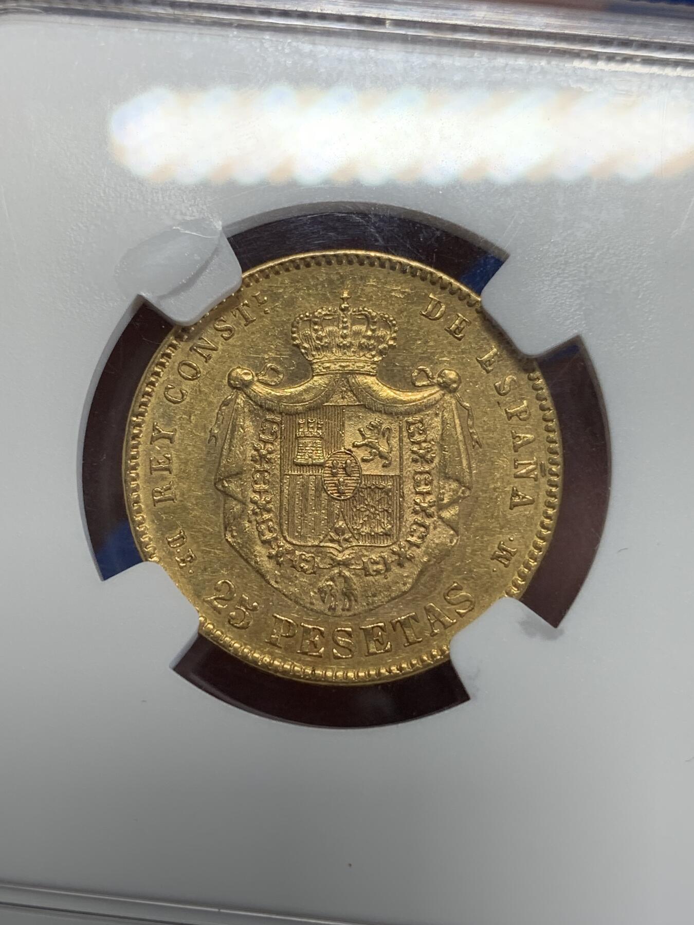 《竞宝斋》第279场- 周日，周一 ，周二3场连拍 （全场包邮） NGC AU58 西班牙 1877年 阿方索十二世25比塞塔金币 8.07克 90%金 金光满溢，铸打深峻，人像肌理真实，状态姣好。阿方索十二世是波旁王朝的西班牙国王（1874年-1885年在位），出生于马德里，是西班牙女王伊丽莎贝二世之子