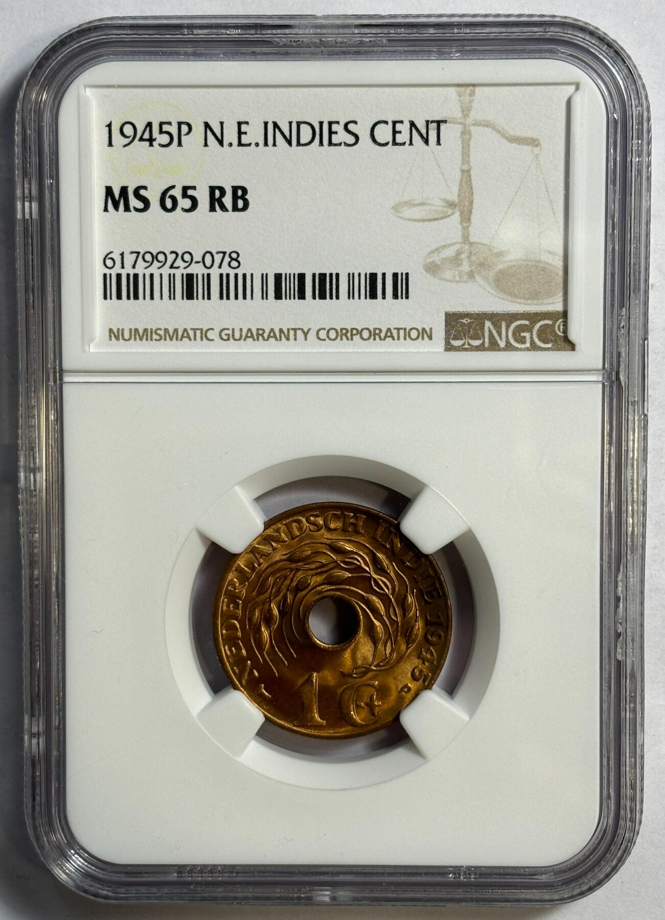 紫瑗钱币——第420期 荷属东印度 1945年 P版 1分 中孔 NGC MS65 RB