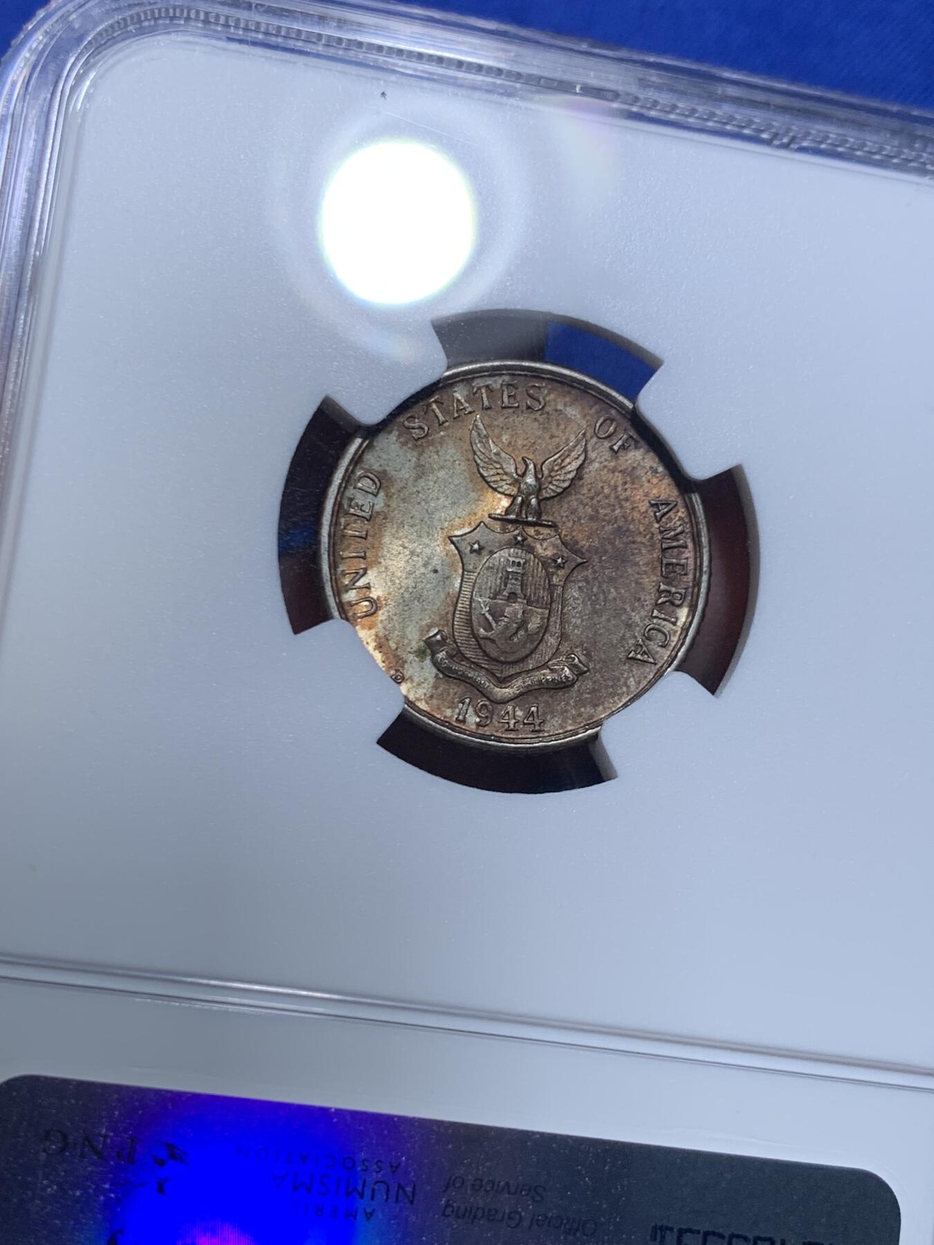 《竞宝斋》第279场- 周日，周一 ，周二3场连拍 （全场包邮） NGC MS64 1944年美属菲律宾20分银币  顶级五彩包浆车轮光，观感极佳