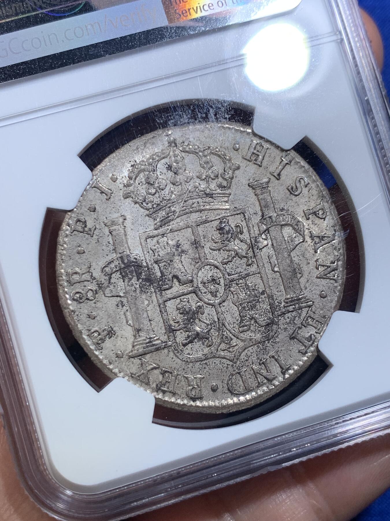 《竞宝斋》第279场- 周日，周一 ，周二3场连拍 （全场包邮） NGC MS62 高分 西属玻利维亚1819年费迪南七世8里亚尔银币 正面底板转光丝滑 背面经典窖藏品相 少见品种