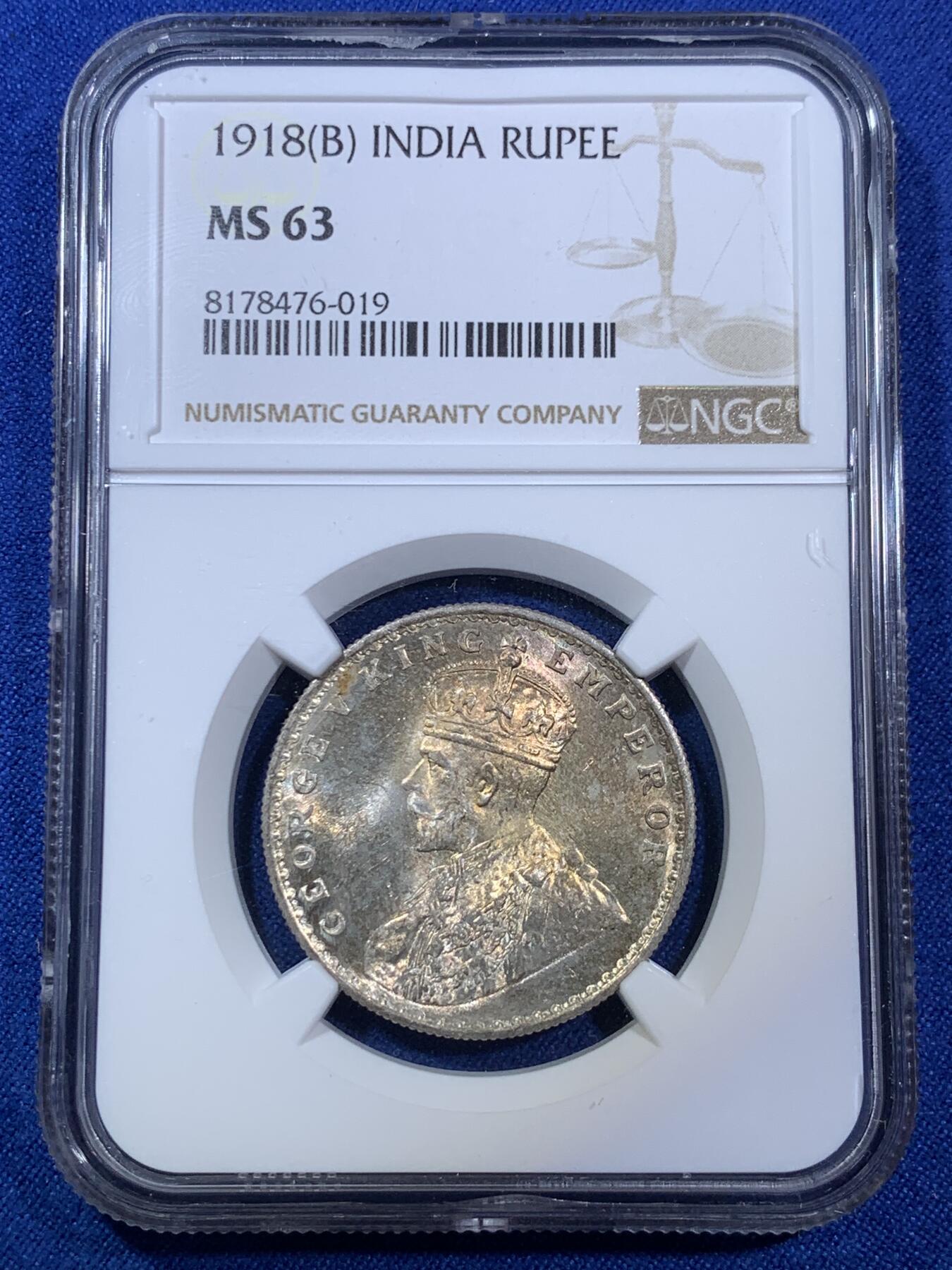 《竞宝斋》第280场- 周日，周一 ，周二3场连拍 （全场包邮） NGC MS63 英属印度1918年乔治五世1卢比银币 正面有暖色调的月牙包浆，过渡自然且光泽兼具，非一般烂大街白光币可比拟。