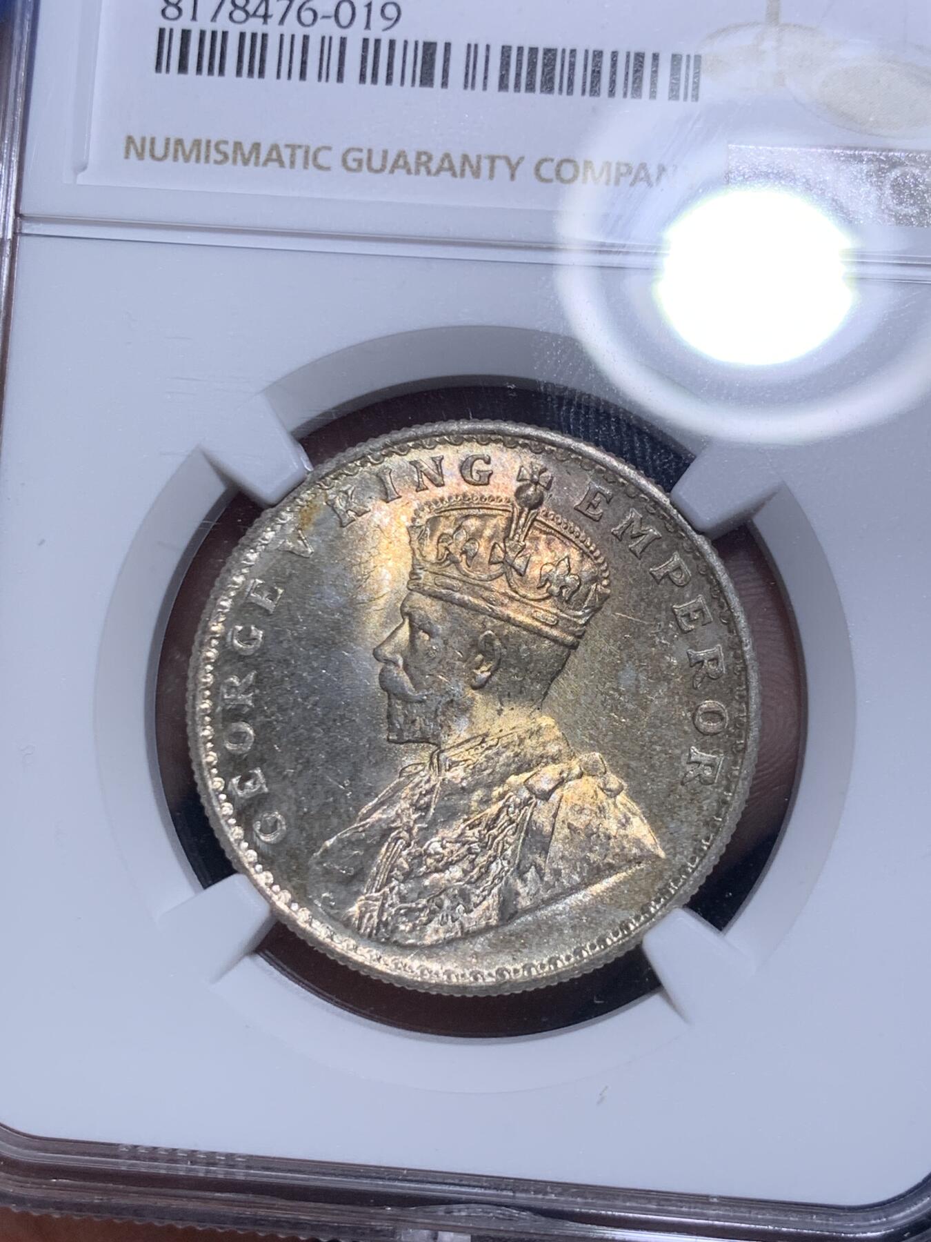 《竞宝斋》第280场- 周日，周一 ，周二3场连拍 （全场包邮） NGC MS63 英属印度1918年乔治五世1卢比银币 正面有暖色调的月牙包浆，过渡自然且光泽兼具，非一般烂大街白光币可比拟。