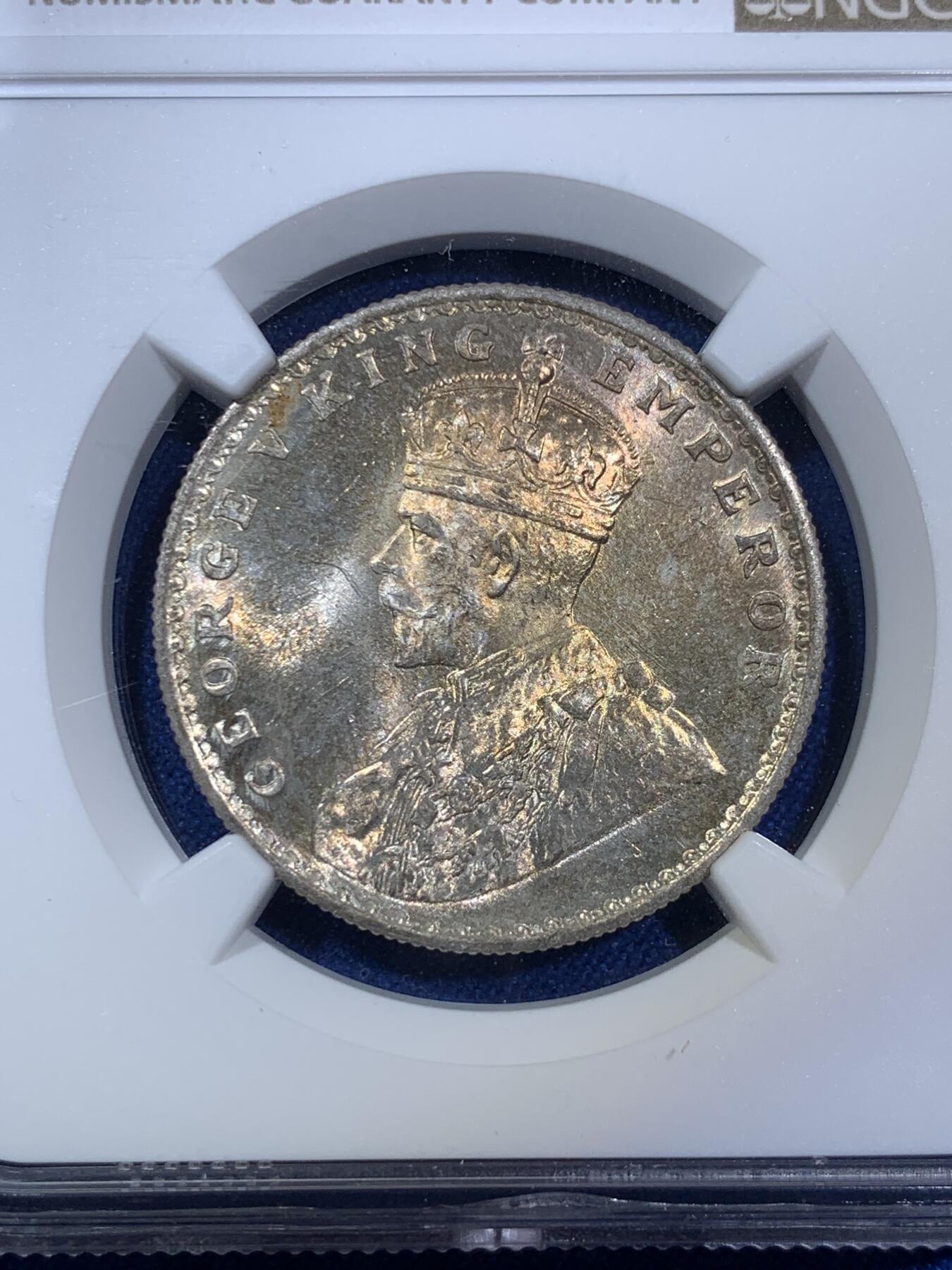 《竞宝斋》第280场- 周日，周一 ，周二3场连拍 （全场包邮） NGC MS63 英属印度1918年乔治五世1卢比银币 正面有暖色调的月牙包浆，过渡自然且光泽兼具，非一般烂大街白光币可比拟。