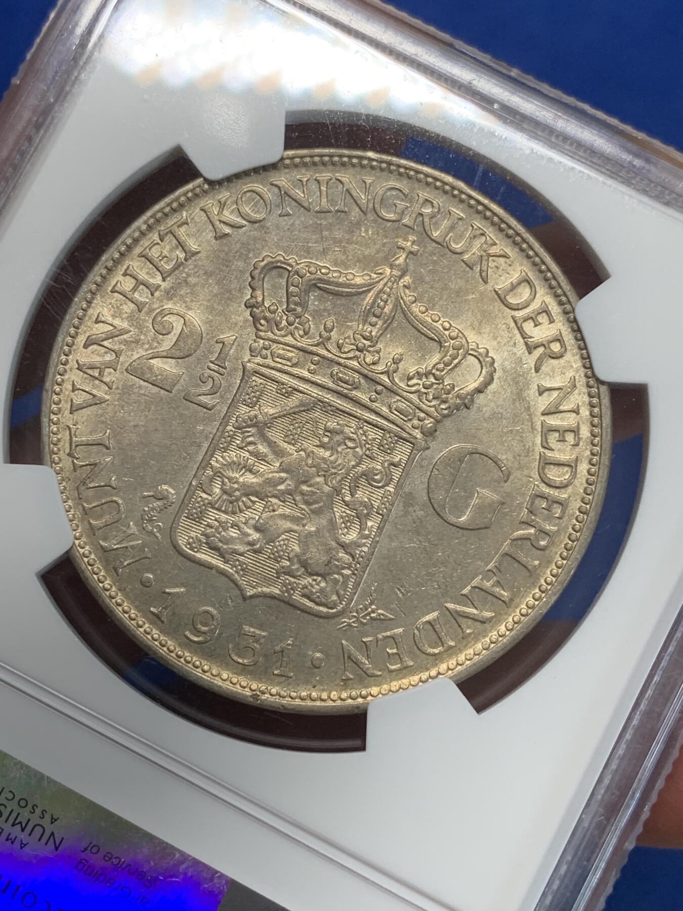 《竞宝斋》第280场- 周日，周一 ，周二3场连拍 （全场包邮） NGC MS62 荷兰1931年威廉敏娜2.5盾银币 金黄色均匀包浆 该品种烂大街但能出分的不多