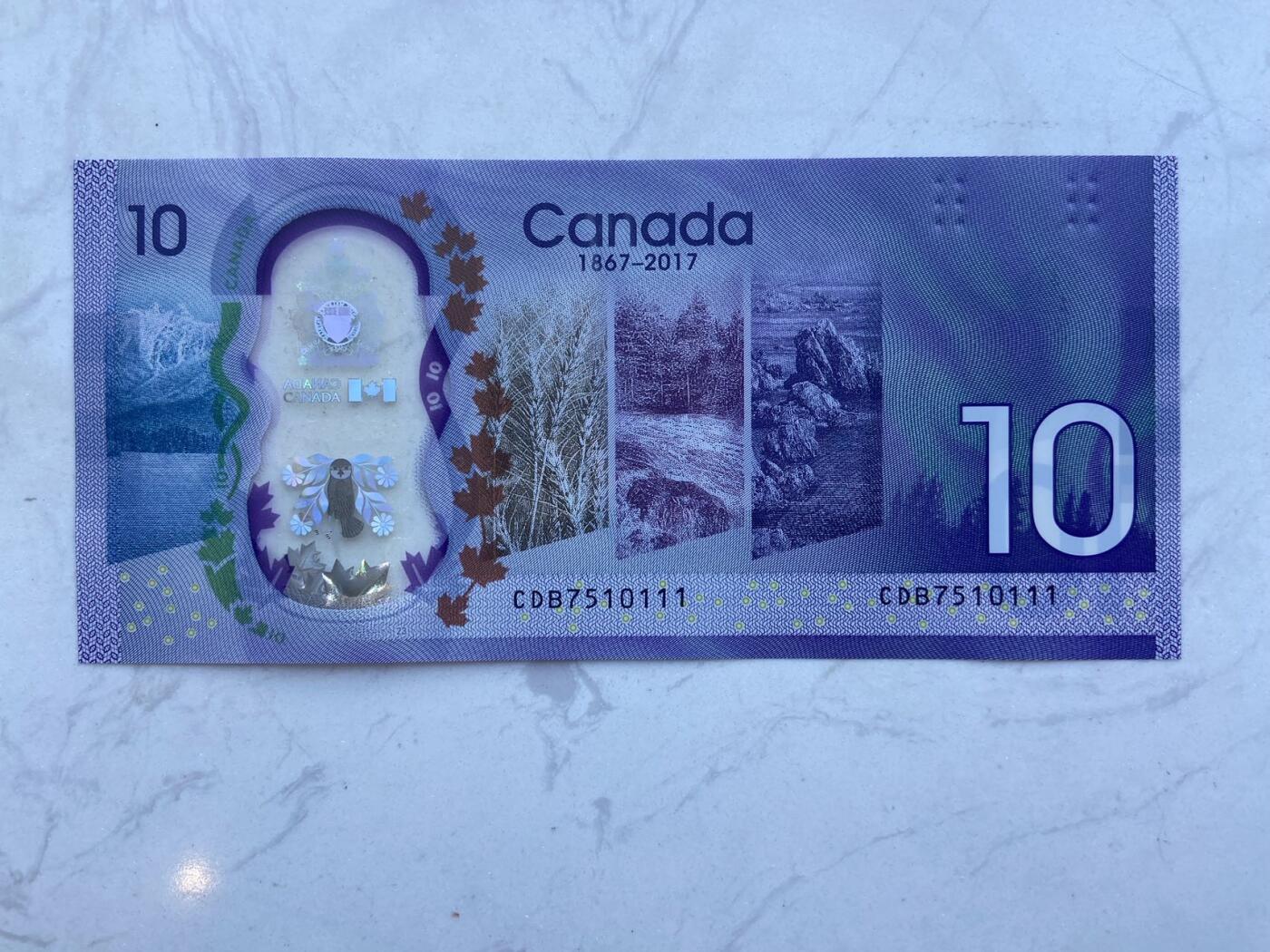 【炜奕收藏】裸钞专场第八期 2017年加拿大建国150周年10元塑料钞，豹子号，unc-品相，有一道未贯穿折痕
