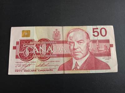 博彦收藏7月2日钱币专场 - 加拿大鸟版50元 流通品右上角有裂