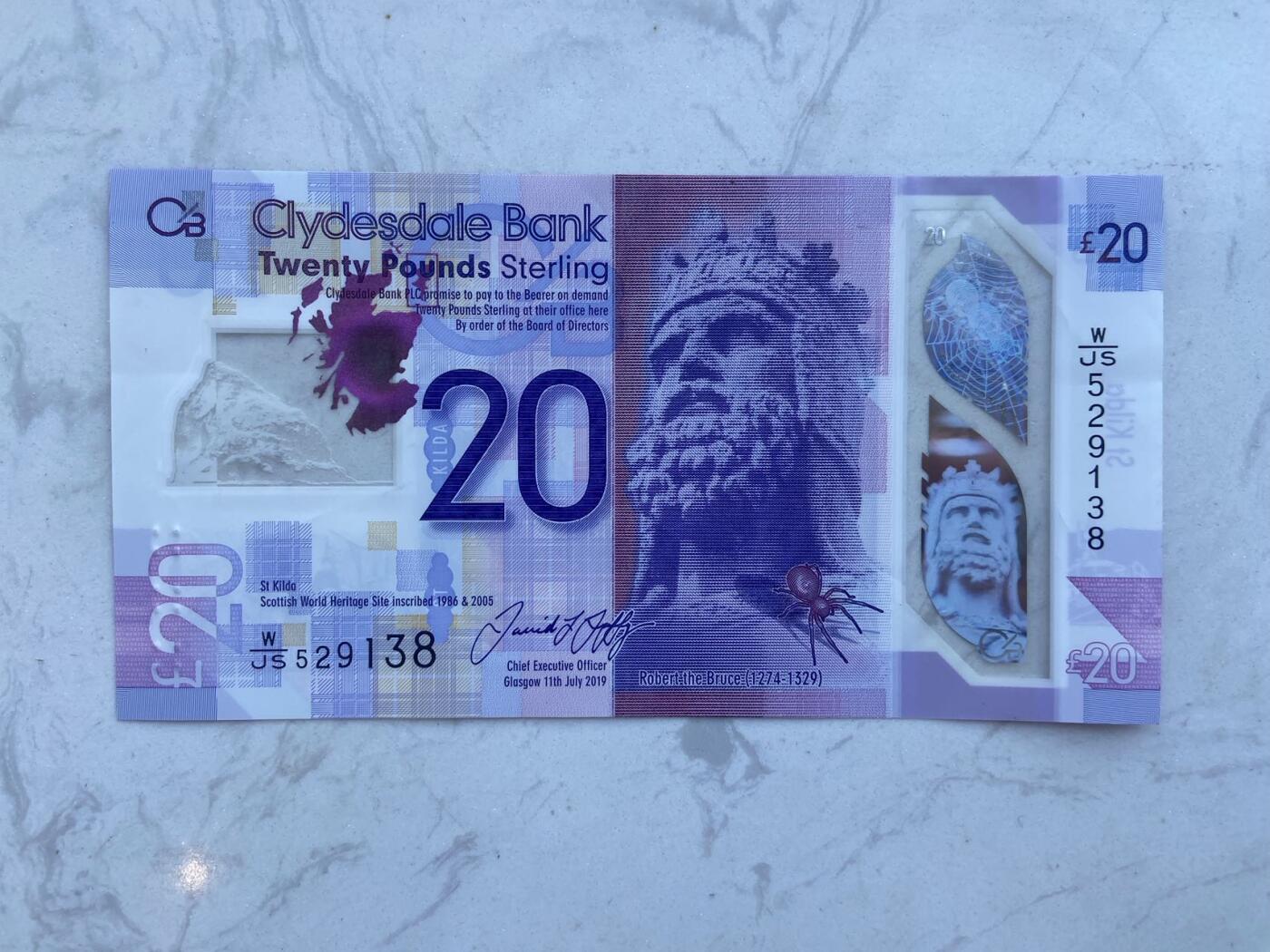 【炜奕收藏】裸钞专场第八期 苏格兰克莱斯戴尔银行20磅，au品相，塑料窗口有轻微折痕