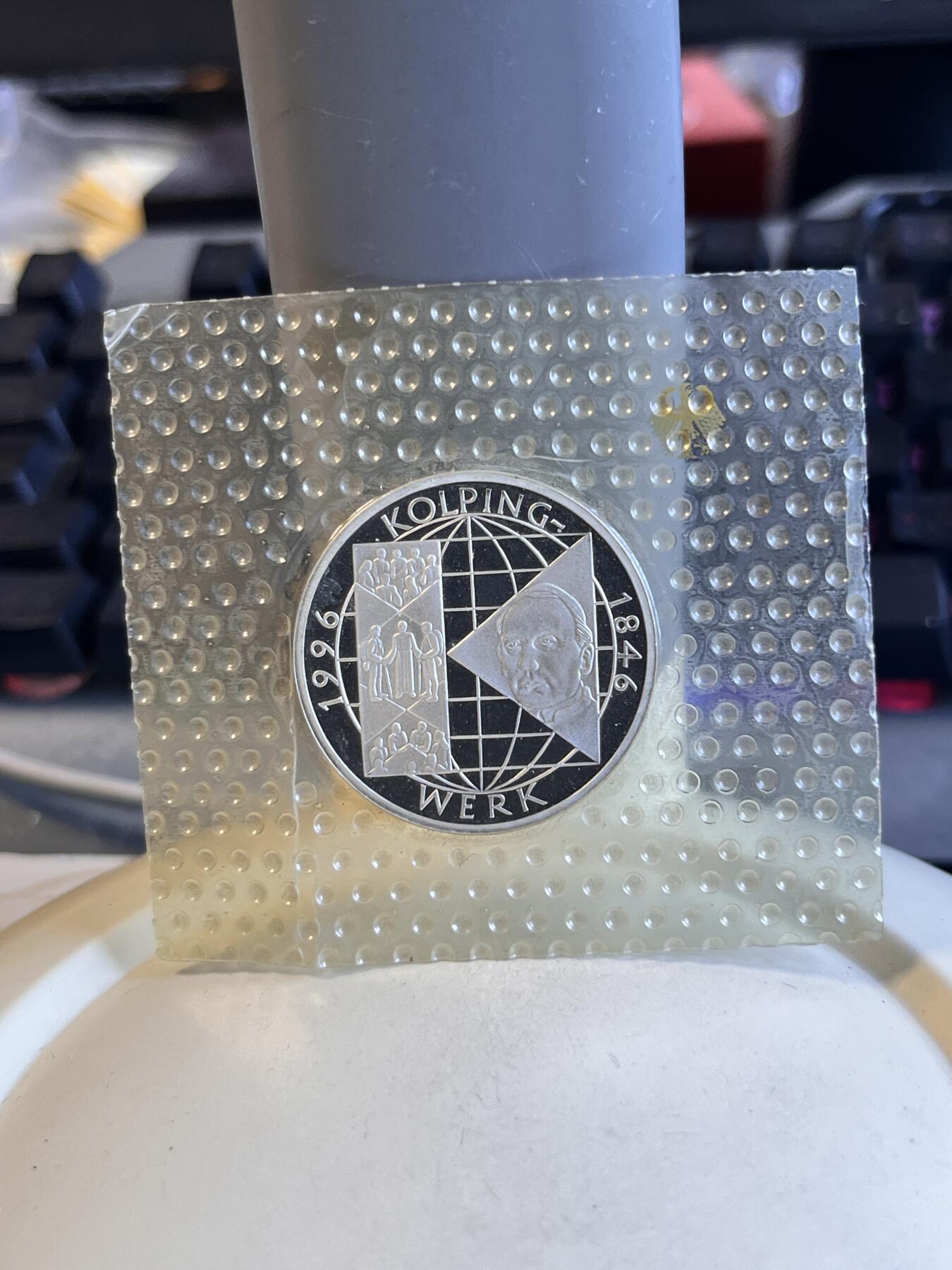 第183期拍卖   原厂塑封德国1996年国际科尔平协会创立150周年精制纪念银币625银15.5克直径32.5毫米，塑料封脱开了