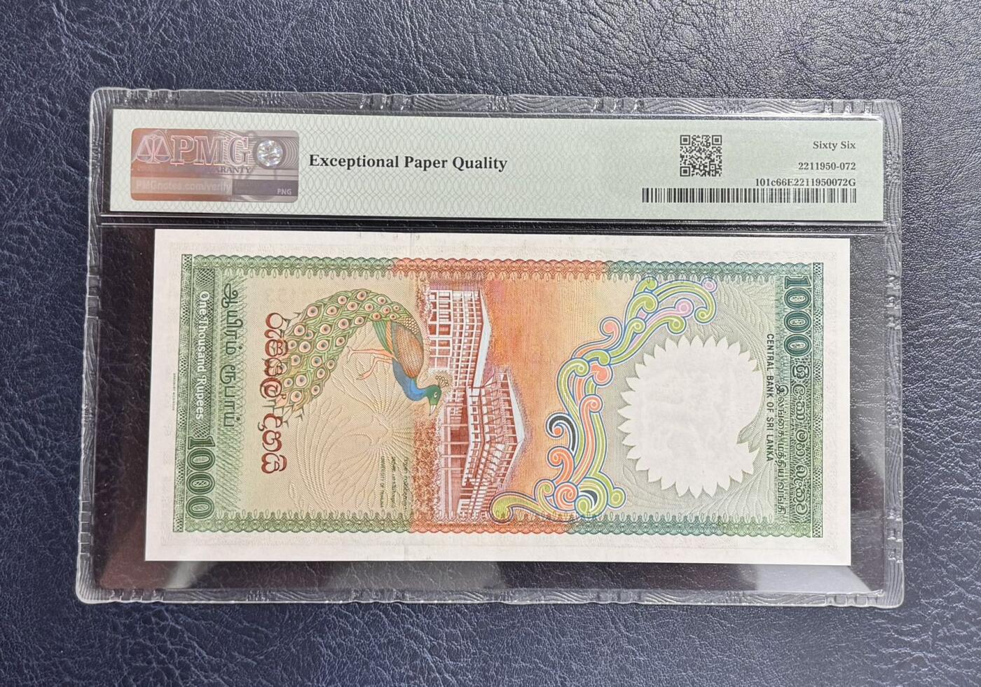 收藏联盟Quantum Auction 第354期拍卖  斯里兰卡1990年1000卢比 PMG66  荧光孔雀王 BWC代印