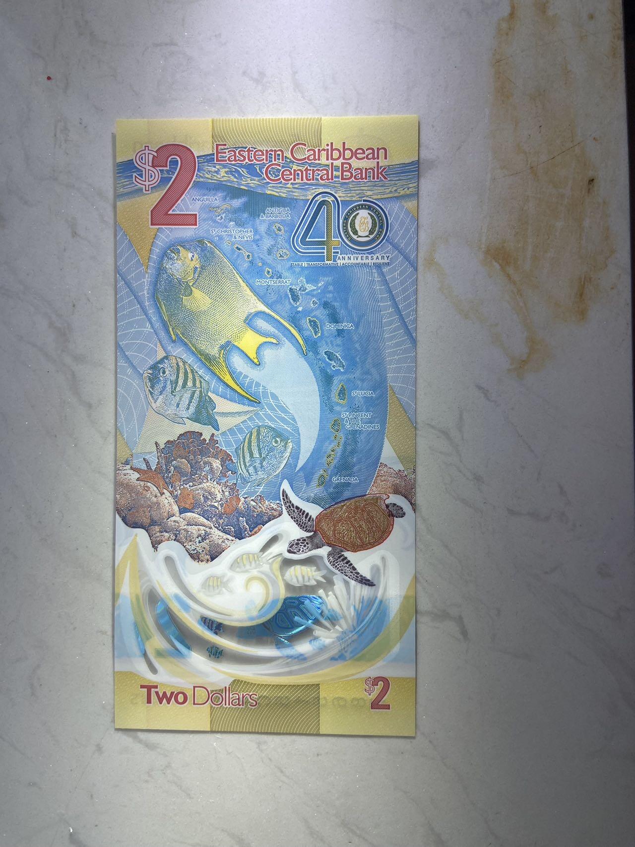 【炜奕收藏】裸钞专场第八期 东加勒比2元塑料钞，获奖钞，unc品相