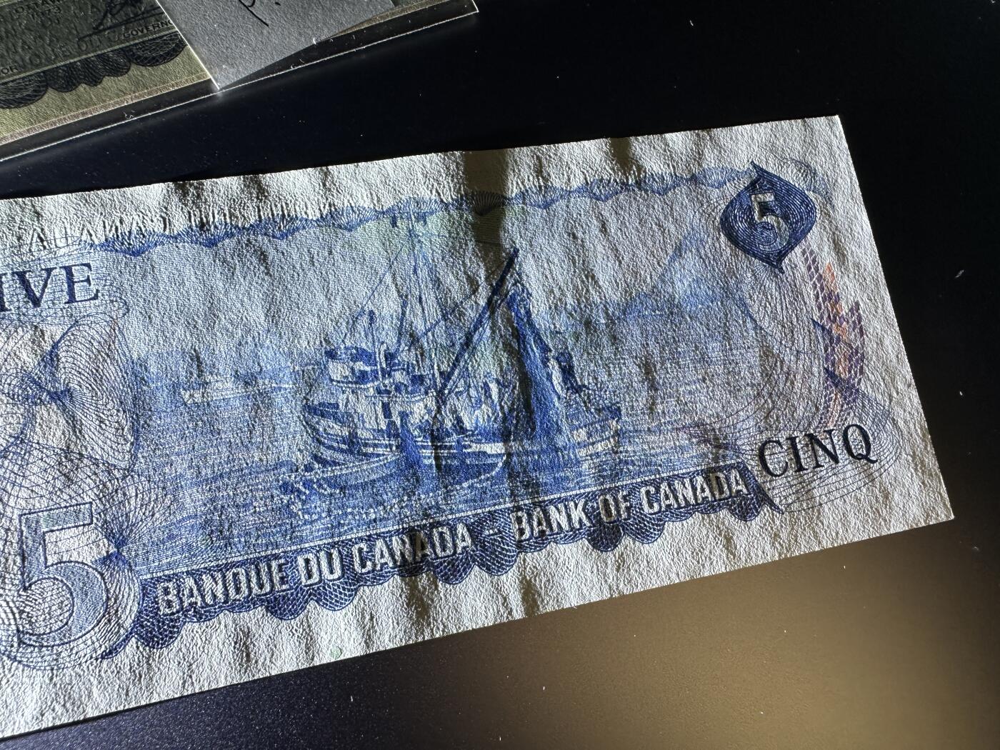 《外钞收藏家》第三百八十一期（美洲小专场） 加拿大1971-74年版小套，1/2/510元，4枚	P85-88 5元轻微几个潮点 有折  其他面额没问题