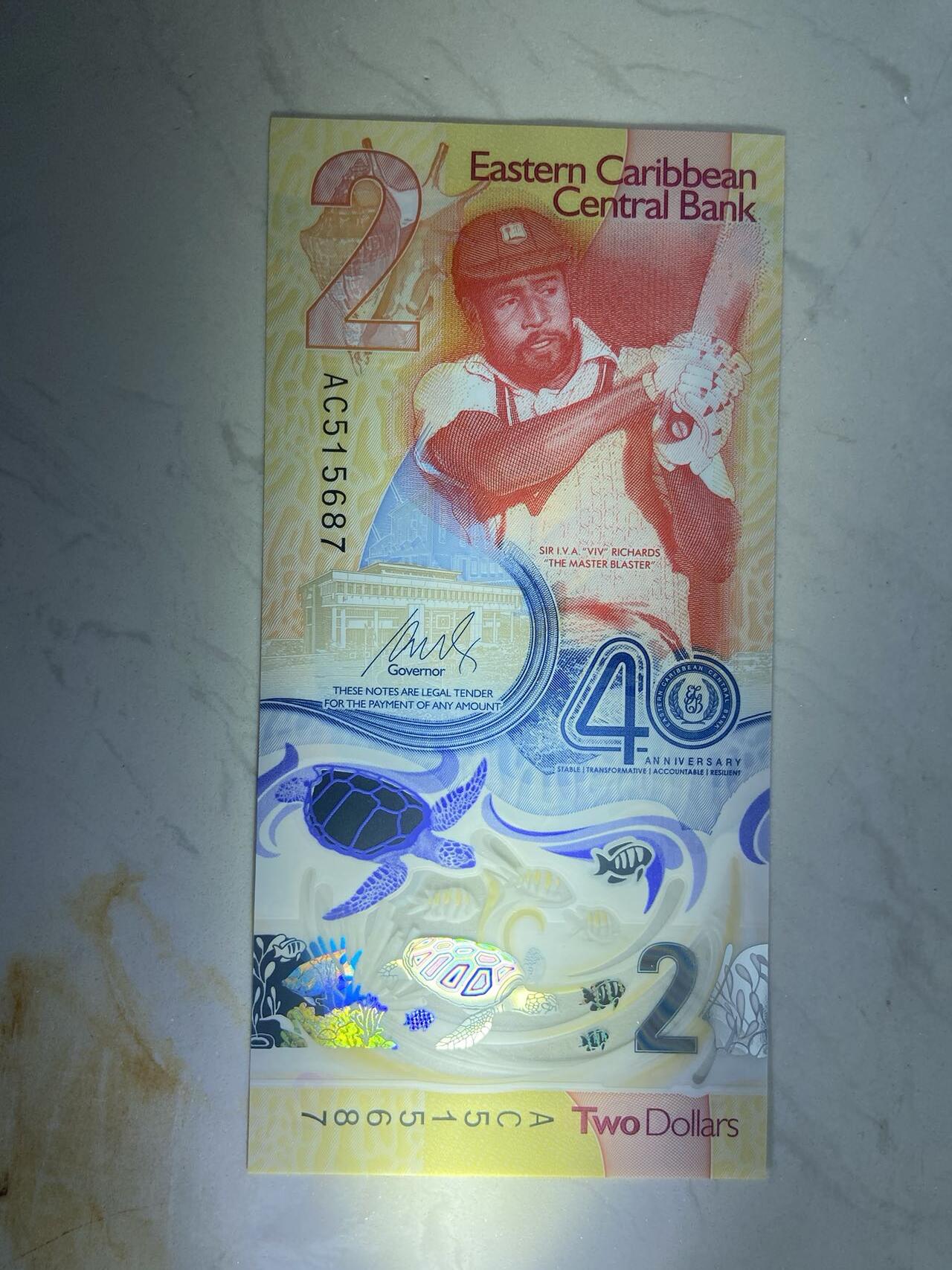 【炜奕收藏】裸钞专场第八期 东加勒比2元塑料钞，获奖钞，unc品相