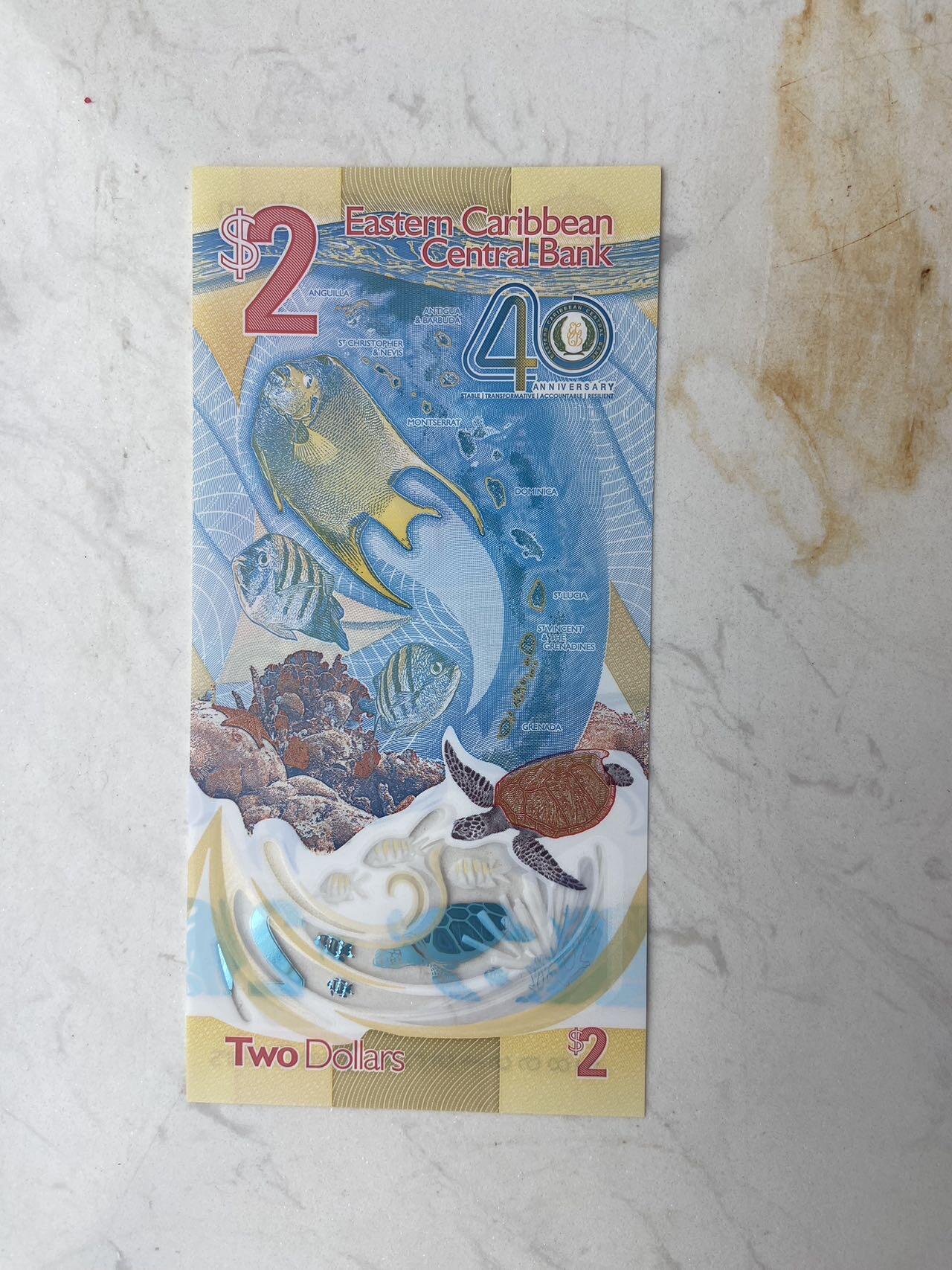 【炜奕收藏】裸钞专场第八期 东加勒比2元塑料钞，获奖钞，unc品相
