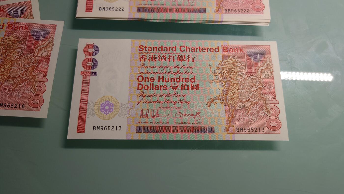 【世界钱币】精选微拍第115期暨2024年第26期  最新维港币展部分卖剩货品展销 1989年香港渣打银行100元 长棍全新绝品无47尾号213
