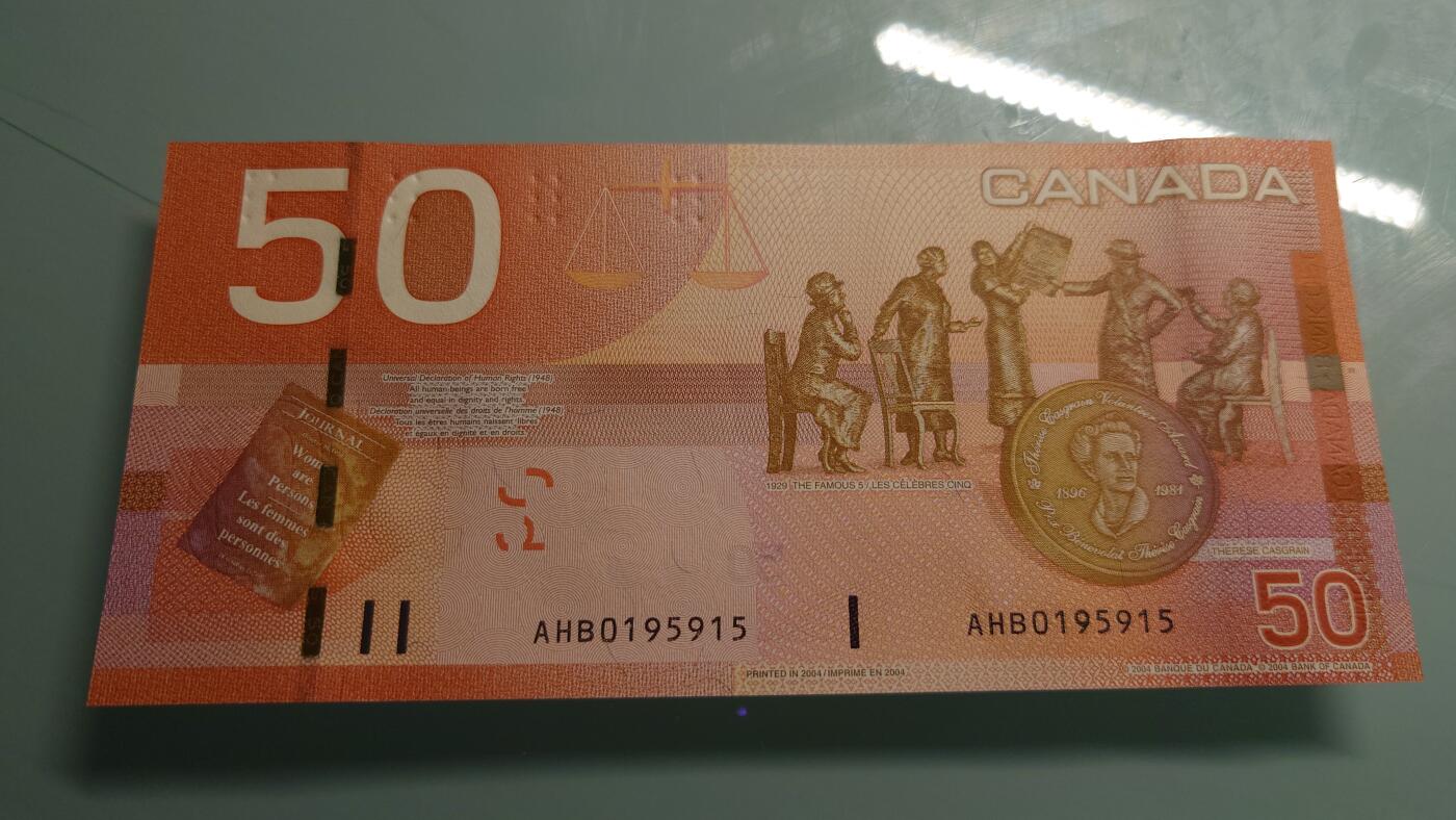 【世界钱币】精选微拍第115期暨2024年第26期  最新维港币展部分卖剩货品展销 2004年加拿大50元旅版 全新绝品无47尾号915