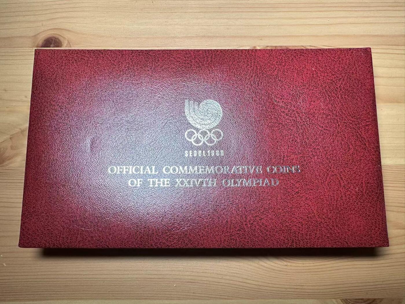 《外钞收藏家》第三百八十二期 韩国1988年奥运会精制纪念币原厂盒装有证书说明 品相如图所示全新UNC（有2-3枚轻微氧化）