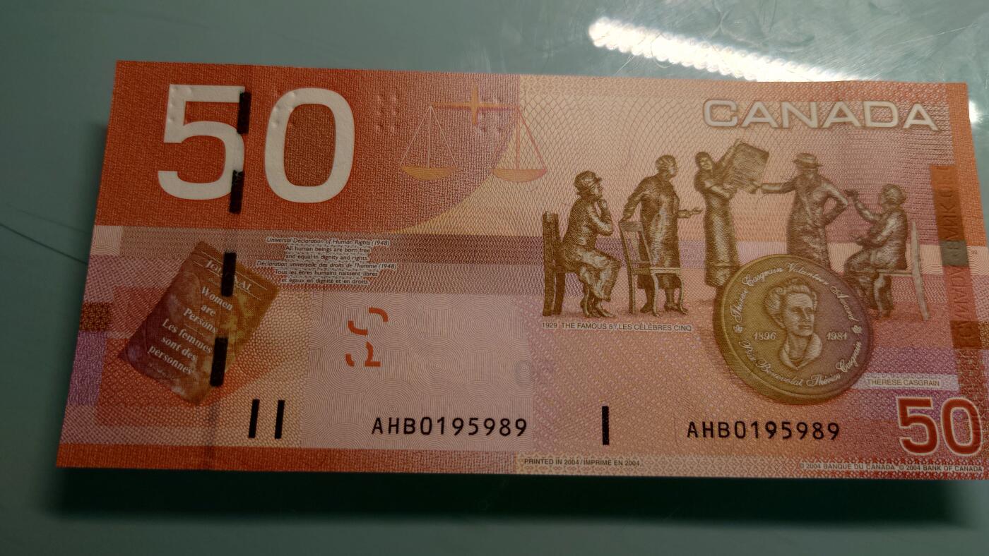 【世界钱币】精选微拍第115期暨2024年第26期  最新维港币展部分卖剩货品展销 2004年加拿大50元旅版 全新绝品无47尾号989
