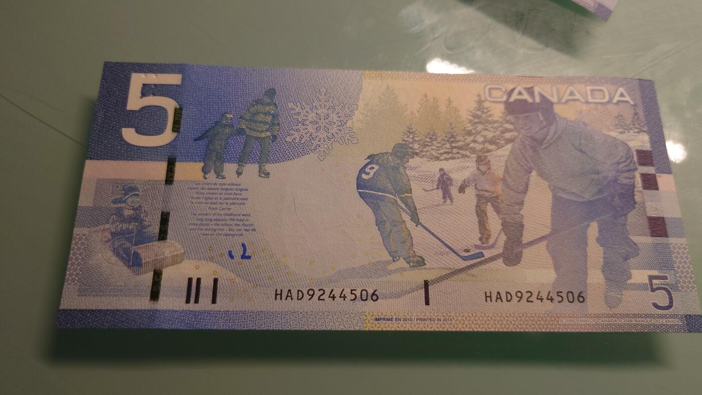 【世界钱币】精选微拍第115期暨2024年第26期  最新维港币展部分卖剩货品展销 2010年加拿大5元 旅版全新绝品尾号506