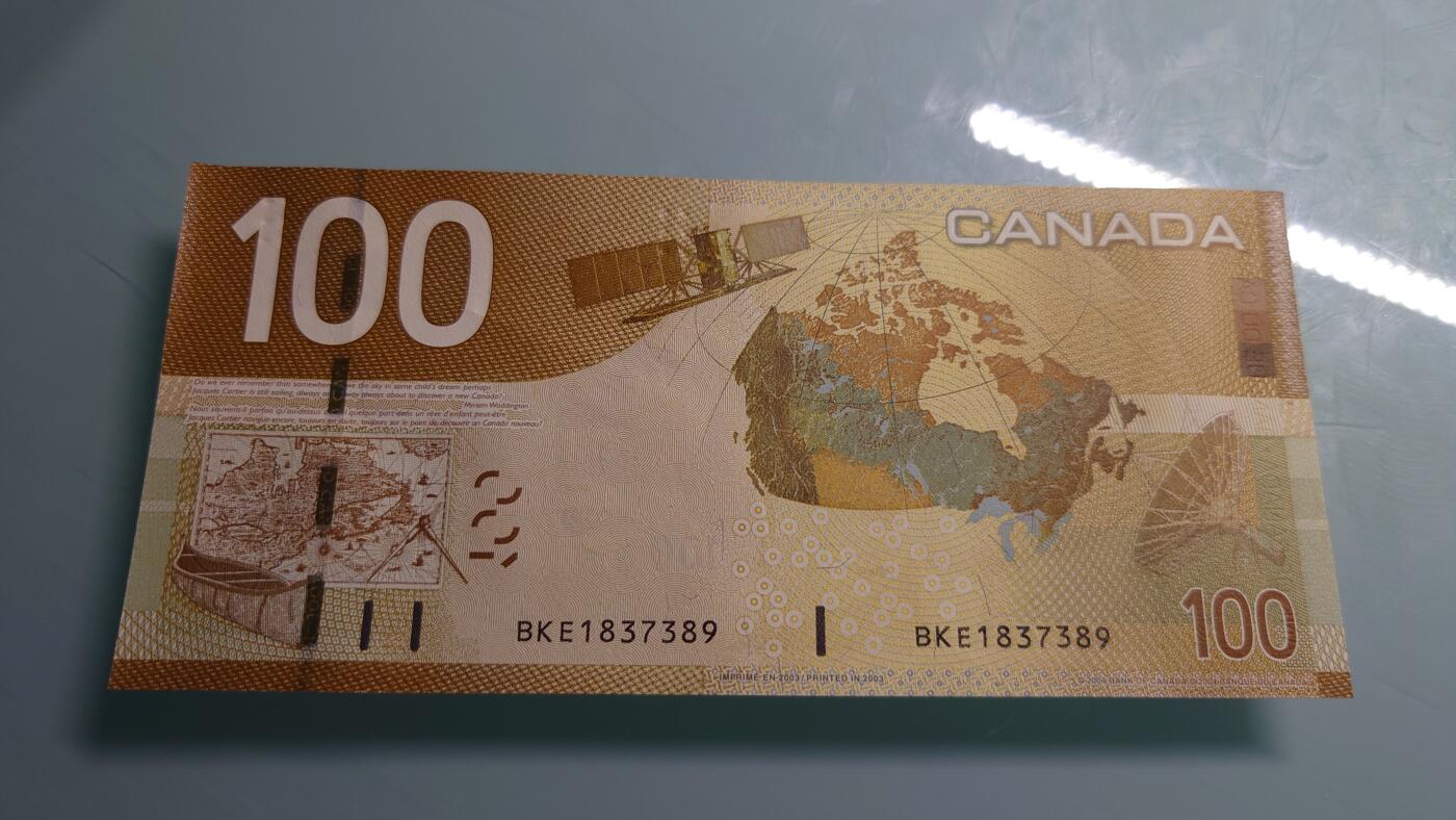 【世界钱币】精选微拍第115期暨2024年第26期  最新维港币展部分卖剩货品展销 2003年加拿大100元 旅版 全新绝品无4尾号389