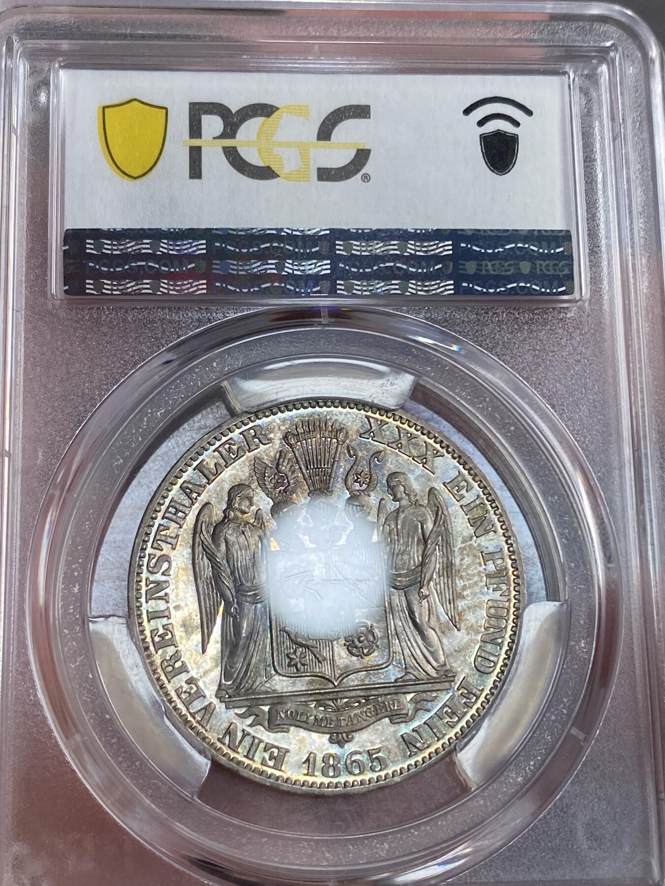 万国钱币拍卖第028期（花前月下●同享良章美币） PCGS MS65 1865年德国绍姆堡-利普天使1泰勒 单年发行7000枚的小邦天使泰勒 汉诺威厂的巅峰之作 无论彩虹般的包浆还是镜子般的底板都将这枚泰勒勾勒为完美的完全体收藏品 PCGS唯二冠军分