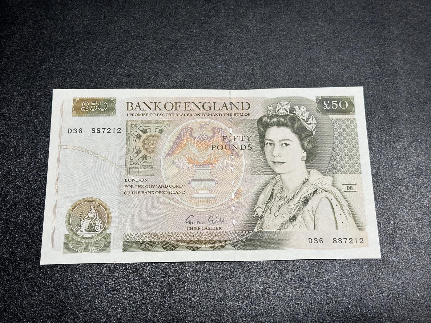 《外钞收藏家》第三百八十三期 英国D序列50镑 全新 左下角轻微油墨 有一个荧光点瑕疵