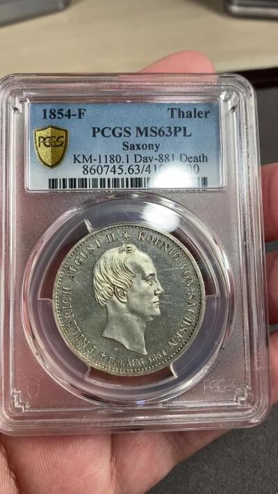万国钱币拍卖第028期（花前月下●同享良章美币） PCGS MS63PL 1854年德国萨克森奥古斯特二世逝世纪念流通1泰勒 双神唯一一枚PROOFLIKE评级记录 其难度不言而喻