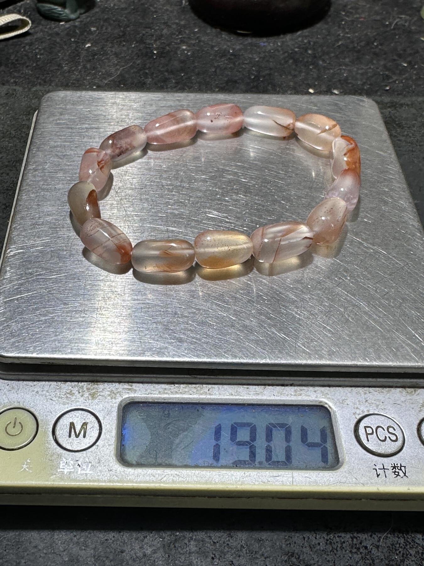 川料南红玛瑙荔枝冻飘红石榴籽形单圈手串一条