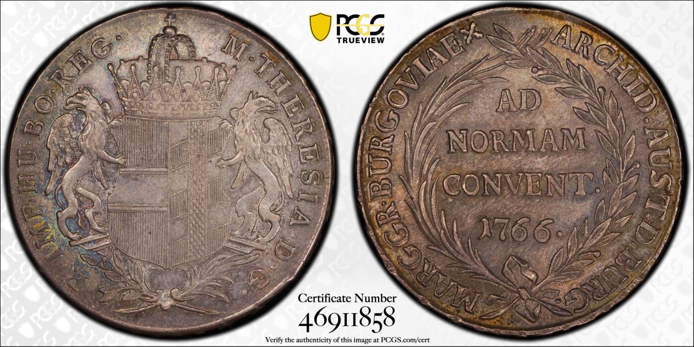万国钱币拍卖第028期（花前月下●同享良章美币） PCGS MS62 1766年奥地利泰勒 布尔高厂 PCGS MS62  玛丽亚·特蕾莎治下的铸币，正面有其M. THERESIA的皇名，搭配经典的双狮鹫盾徽而非胸像。  两面深打，原始均匀包浆，带有蓝绿色调。