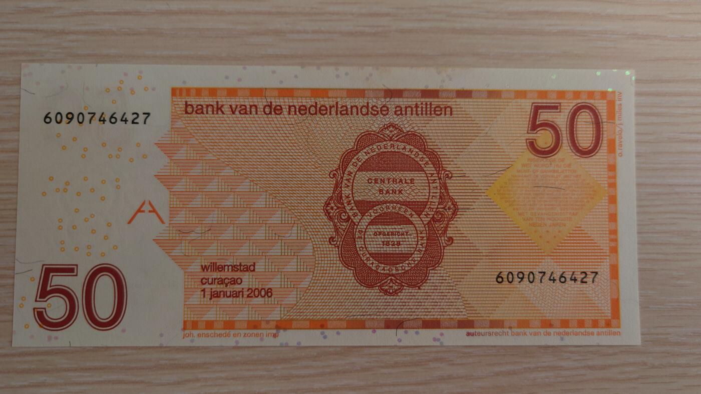 【世界钱币】精选微拍第115期暨2024年第26期  最新维港币展部分卖剩货品展销 2006年荷属安地列斯50盾 全新绝品