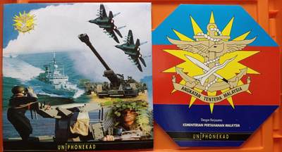 《卡拍》第294期拍卖6月30日晚22：10时延时截拍 马来西亚GPT卡《海海空军、维和部队》四全新卡，珍藏版光学卡《兰卡威海空展》两套十全新卡，共三册，上品，其中一枚光学卡边缘轻微氧化。