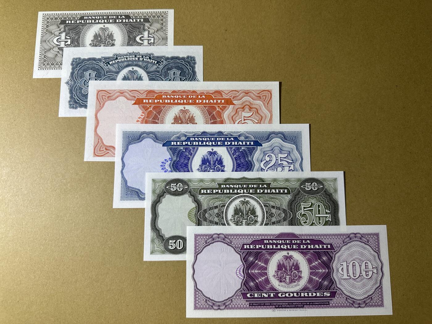 《张总收藏》156期-欧亚外币超精品场 海地1、2、5、10、25、100古德6张 UNC