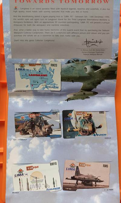 《卡拍》第294期拍卖6月30日晚22：10时延时截拍 马来西亚GPT卡《海海空军、维和部队》四全新卡，珍藏版光学卡《兰卡威海空展》两套十全新卡，共三册，上品，其中一枚光学卡边缘轻微氧化。