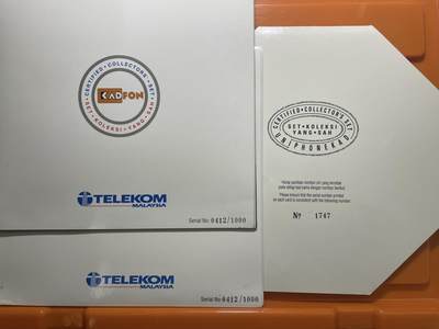 《卡拍》第294期拍卖6月30日晚22：10时延时截拍 马来西亚GPT卡《海海空军、维和部队》四全新卡，珍藏版光学卡《兰卡威海空展》两套十全新卡，共三册，上品，其中一枚光学卡边缘轻微氧化。