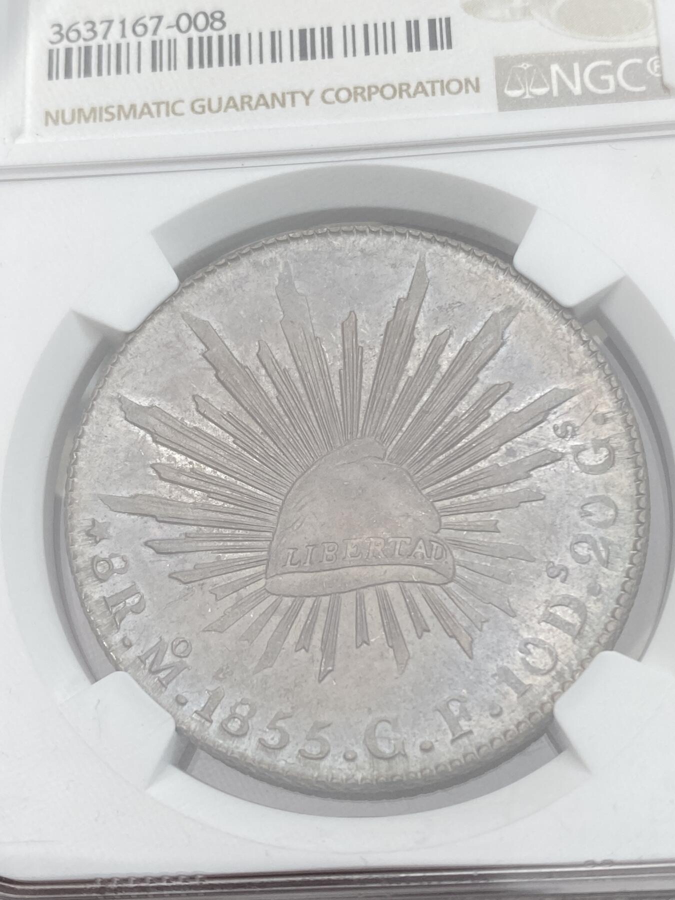 万国钱币拍卖第028期（花前月下●同享良章美币） NGC MS64 1855年墨西哥鹰洋8里亚尔 花边鹰洋 在华流通 MO-GF早期年份少见版别，双面老包浆，可爱粉紫彩。打制锐利，实物状态极佳。数据库亚军分，评级数稀少。