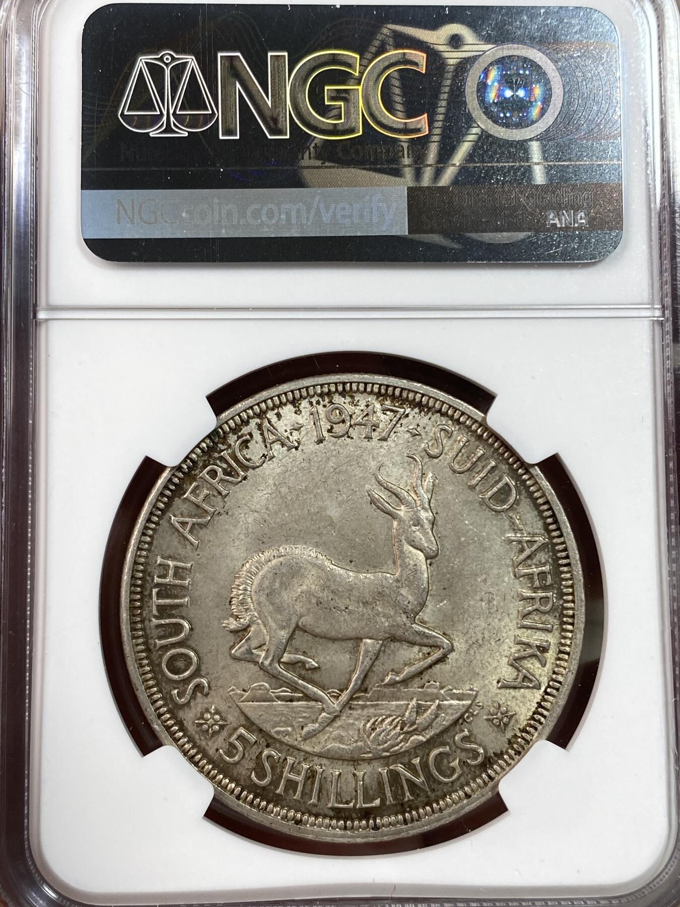 万国钱币拍卖第028期（花前月下●同享良章美币） NGC MS62 1947年英属南非乔治六世5先令大银币 经典的南非羚羊