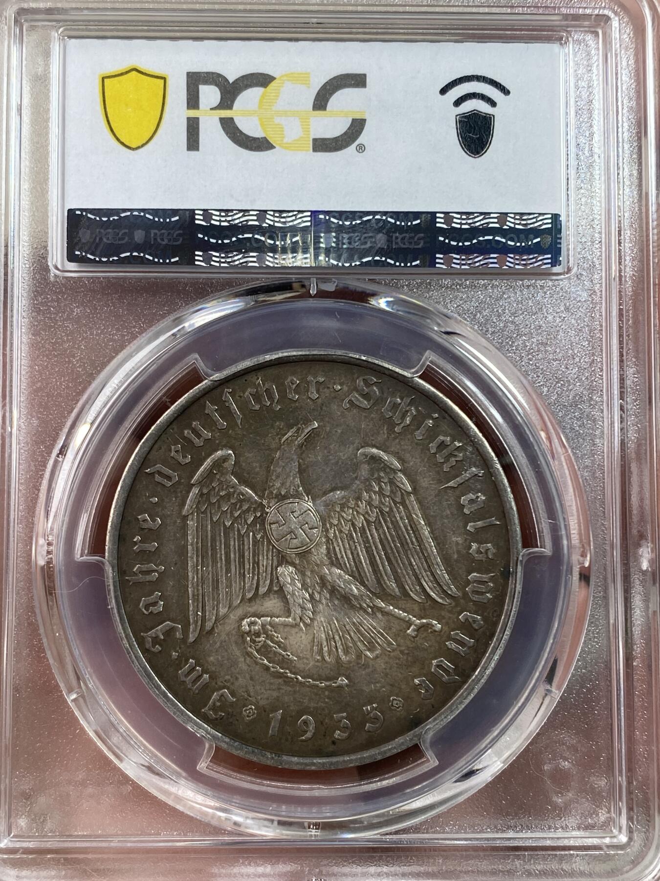 万国钱币拍卖第028期（花前月下●同享良章美币） PCGS SP62 1933年德国民族社会主义工人党党魁执政纪念银章 经典力作 原味酱彩难得