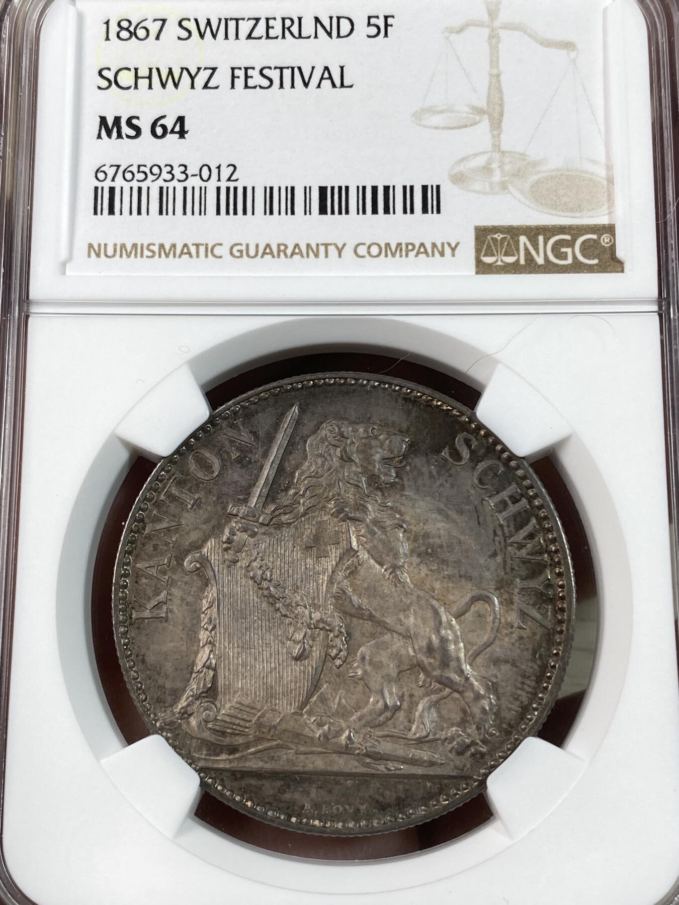 万国钱币拍卖第028期（花前月下●同享良章美币） NGC MS64 1867年瑞士施维茨射击节5法郎大银币 渐变青蓝色玫瑰金彩  瑞射5法郎中的难点之一