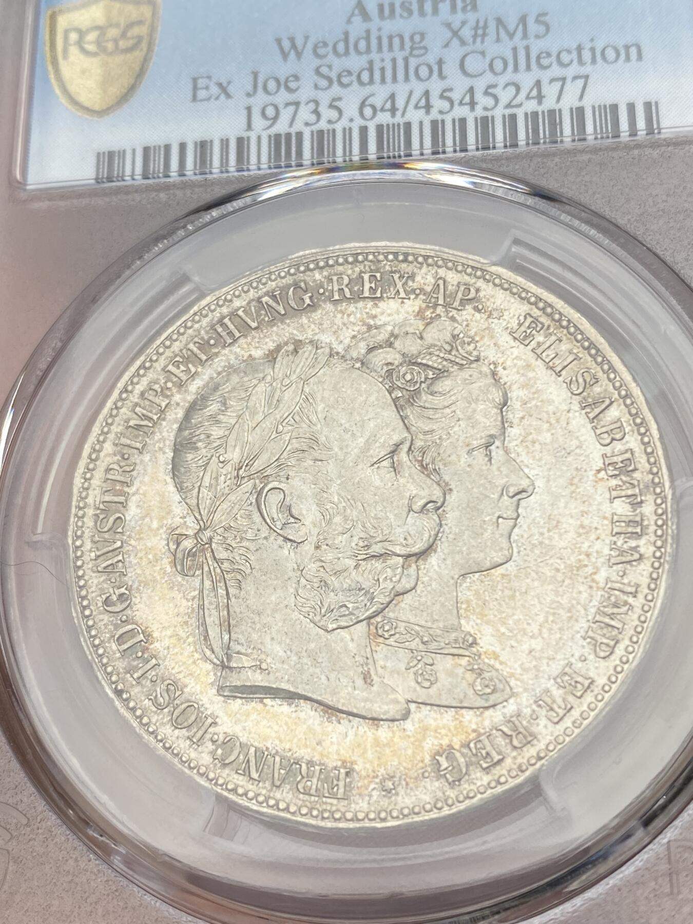 万国钱币拍卖第028期（花前月下●同享良章美币） PCGS MS64 1879年奥地利佛朗茨一世与茜茜公主银婚纪念2盾 顶级BU状态，淡金彩包浆，强流银霜光，pl感强烈，实物炫目，万里挑一的品质。