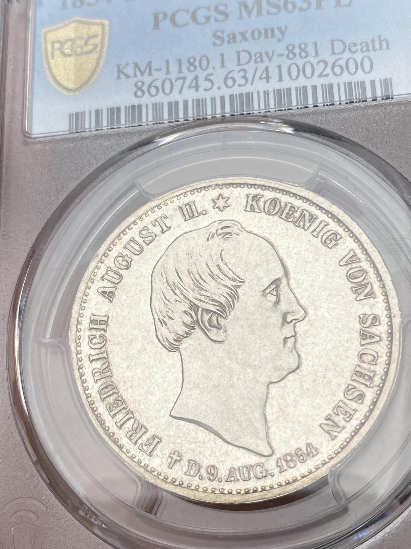 万国钱币拍卖第028期（花前月下●同享良章美币） PCGS MS63PL 1854年德国萨克森奥古斯特二世逝世纪念流通1泰勒 双神唯一一枚PROOFLIKE评级记录 其难度不言而喻