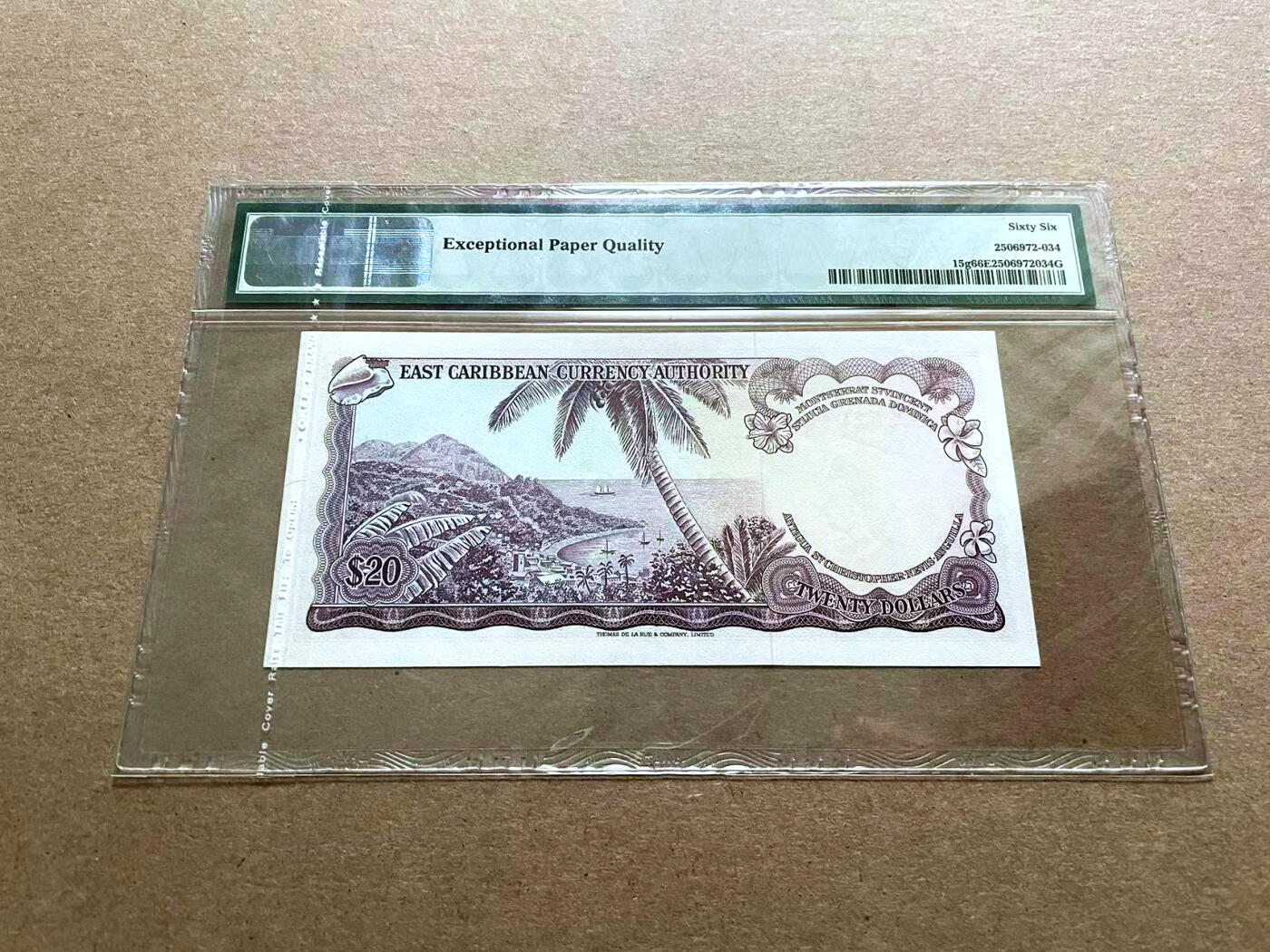 【Blue Auction】✨世界纸币精拍第500期盛典——白金之夜🔥🔥🔥 E-东加勒比 1965年20元 戎装女王 PMG66EPQ 背面海景风光旖旎