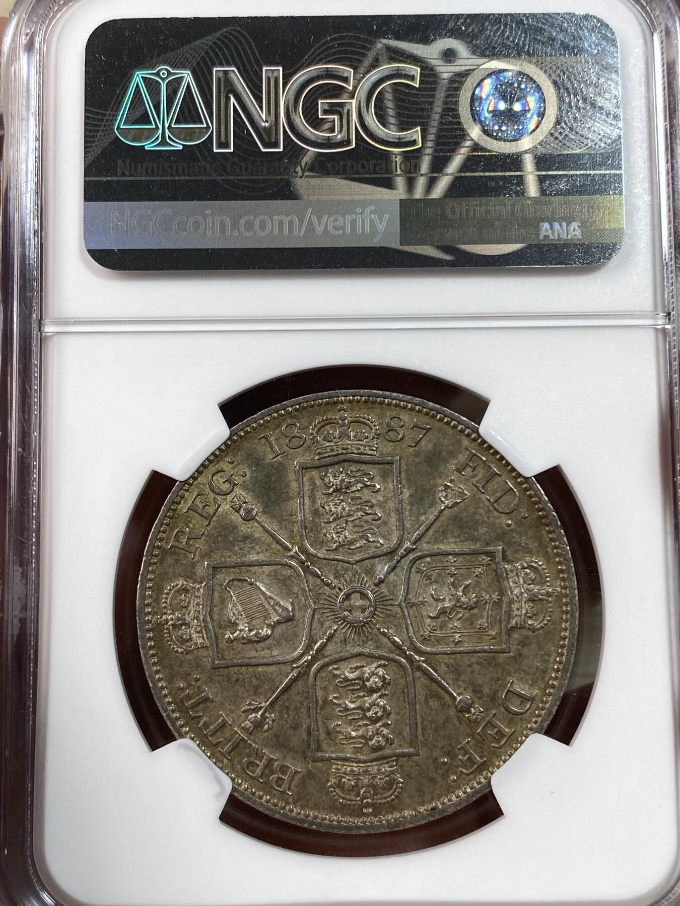 万国钱币拍卖第028期（花前月下●同享良章美币） NGC MS62 1887年英国维多利亚女皇高冠4先令大银币 英系五彩包浆