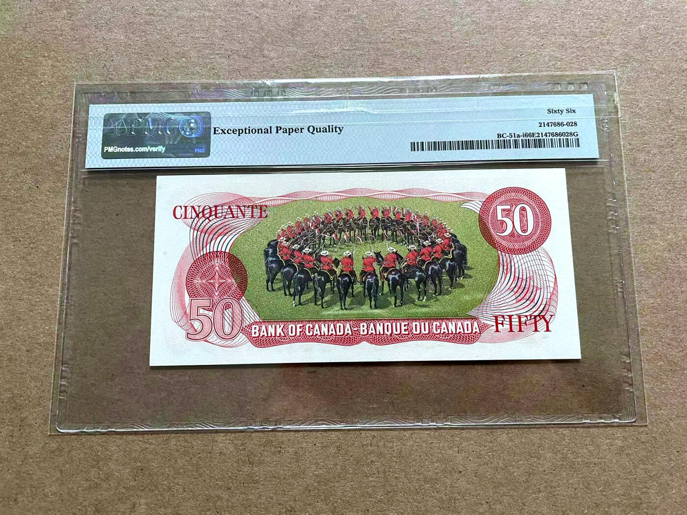 【Blue Auction】✨世界纸币精拍第500期盛典——白金之夜🔥🔥🔥 C-【888豹子号无47】加拿大 1975年50元 PMG66EPQ “穹顶”式骑警