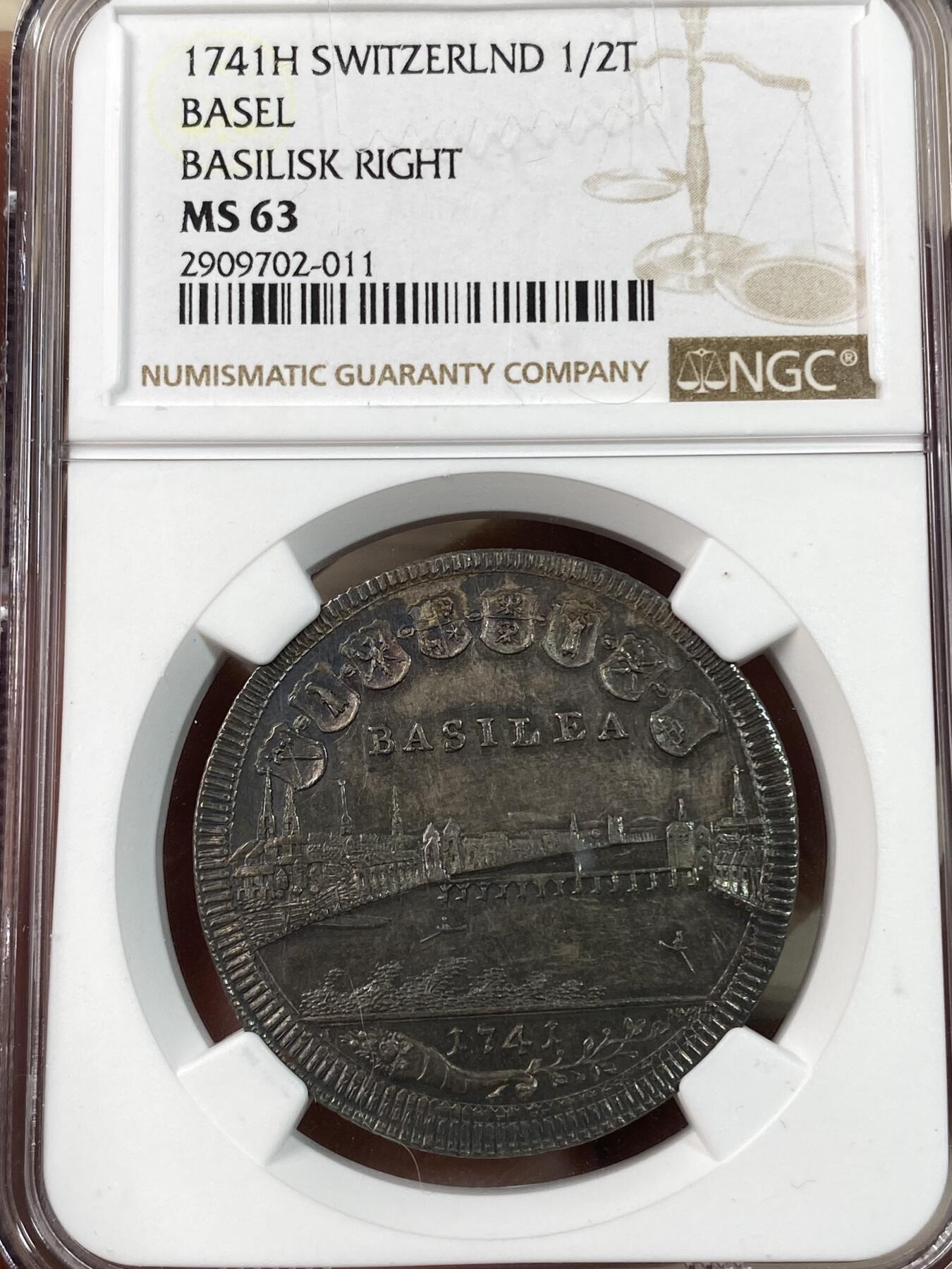 万国钱币拍卖第028期（花前月下●同享良章美币） NGC MS63 1741年瑞士巴赛尔景观1/2泰勒 全深打+重五彩巴赛尔景观可谓凤毛麟角 常见的减重痕也未出现 此枚可谓收藏精品