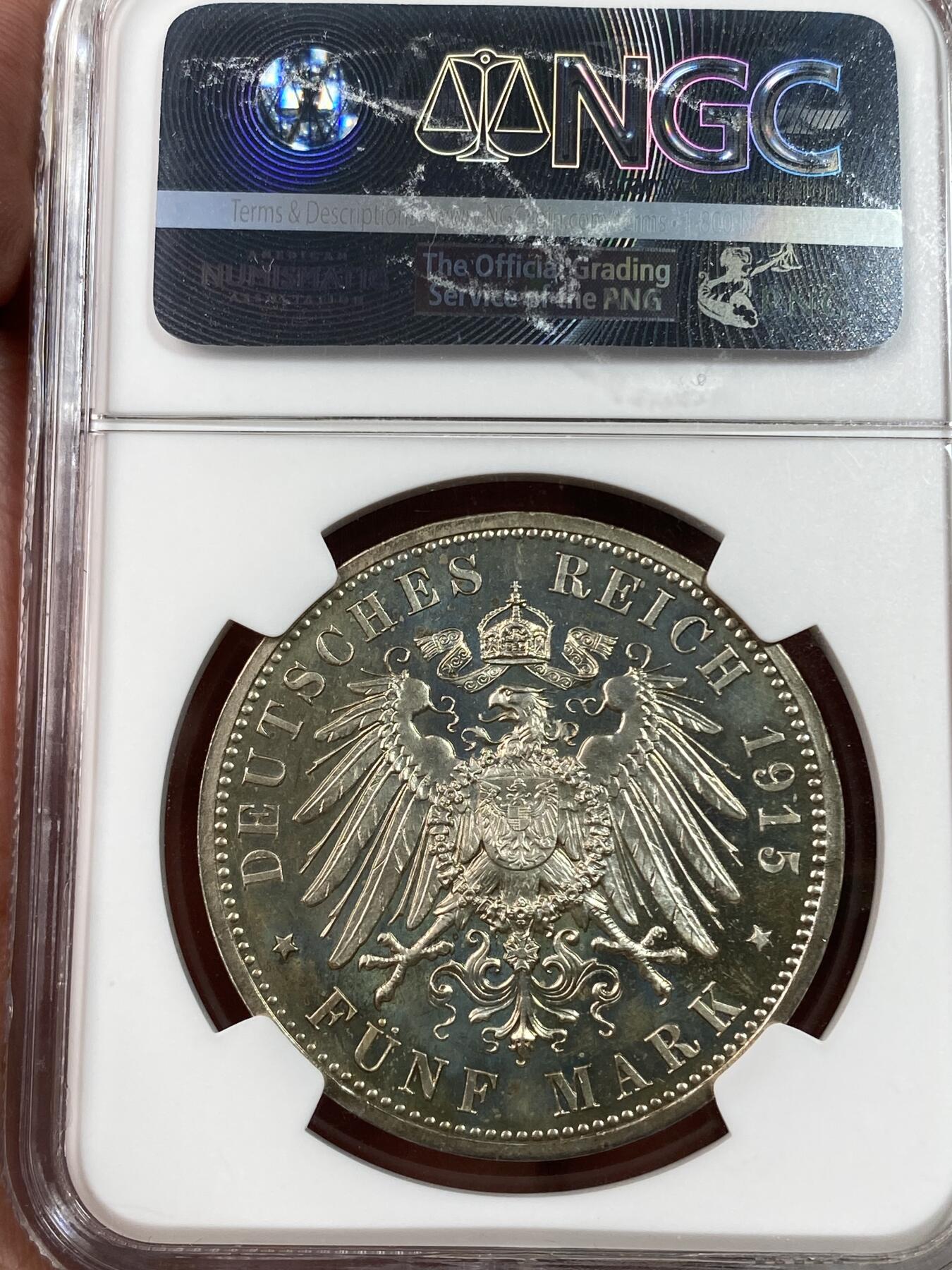 万国钱币拍卖第028期（花前月下●同享良章美币） NGC PF64CAM 1915年德国不伦瑞克-沃尔芬比特尔奥古斯特与路易斯结婚纪念流通5马克 高分精致镜面 柏林铸币厂 浓厚的镜面喷砂感 刚刚结束的HA拍卖PF62不带CAM成交价840美金供参考