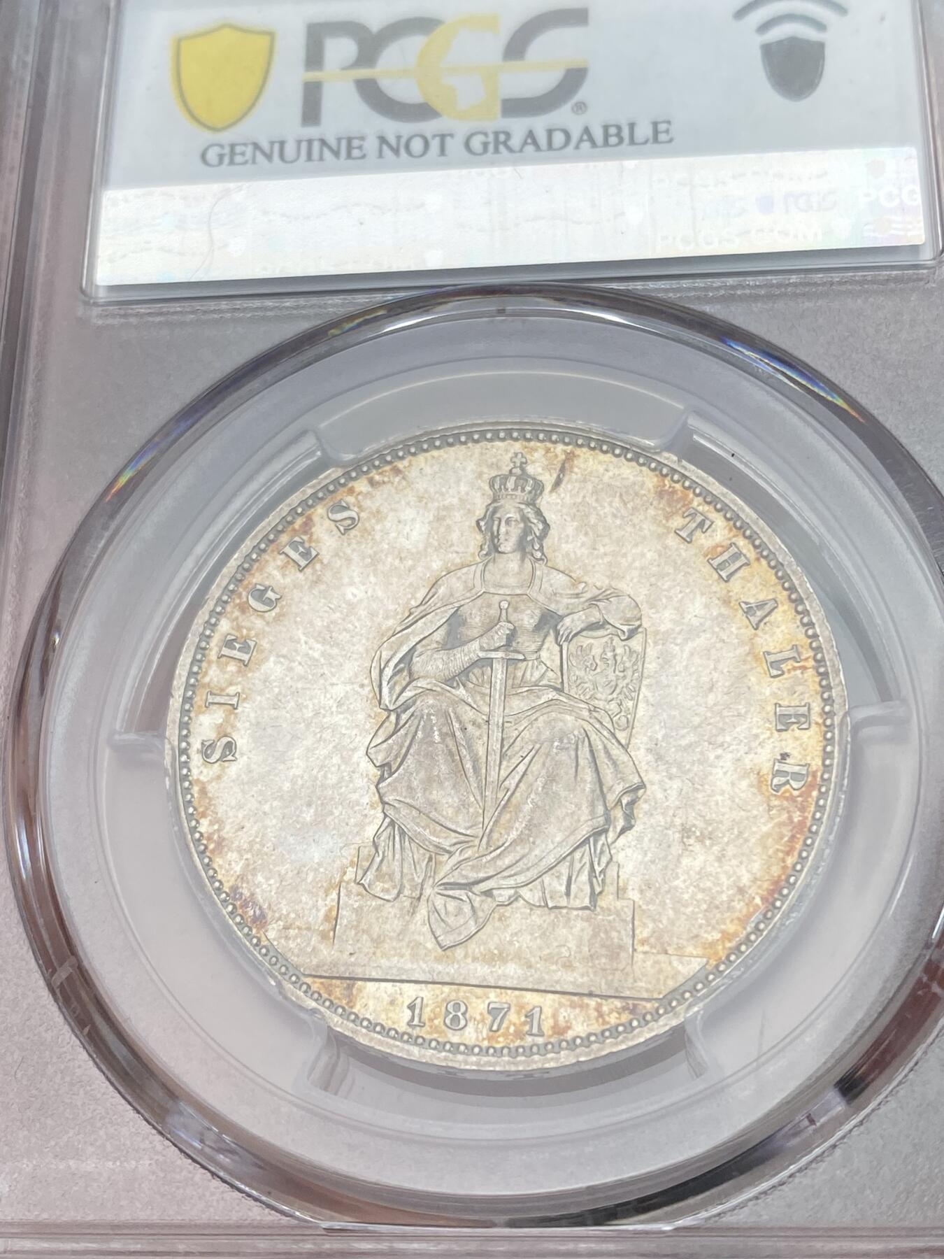 万国钱币拍卖第028期（花前月下●同享良章美币） PCGS UNCD 1871年德国普鲁士普法战争胜利1泰勒 高点表现不错 有清洗痕迹 整体呈镜面状态
