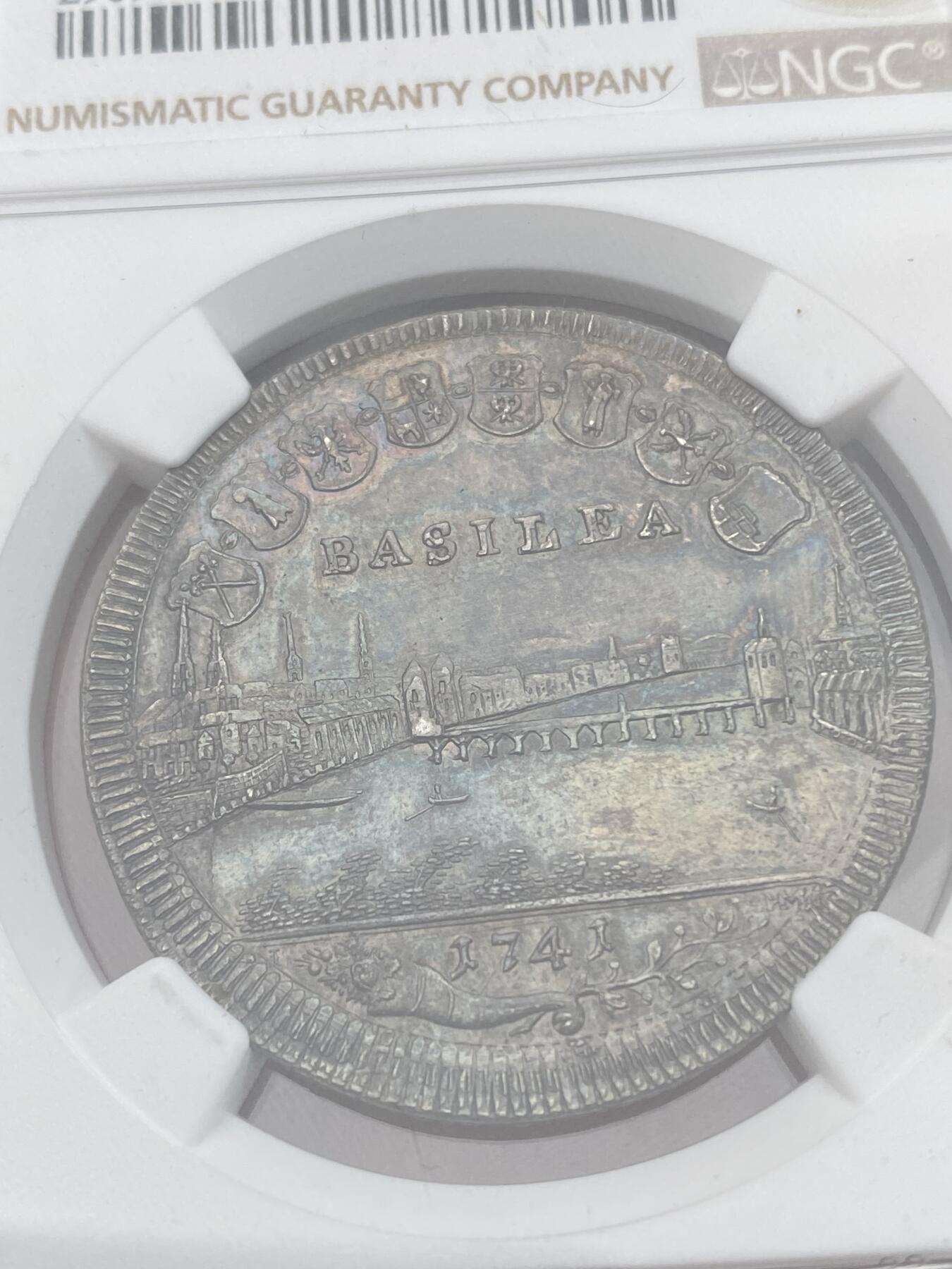 万国钱币拍卖第028期（花前月下●同享良章美币） NGC MS63 1741年瑞士巴赛尔景观1/2泰勒 全深打+重五彩巴赛尔景观可谓凤毛麟角 常见的减重痕也未出现 此枚可谓收藏精品